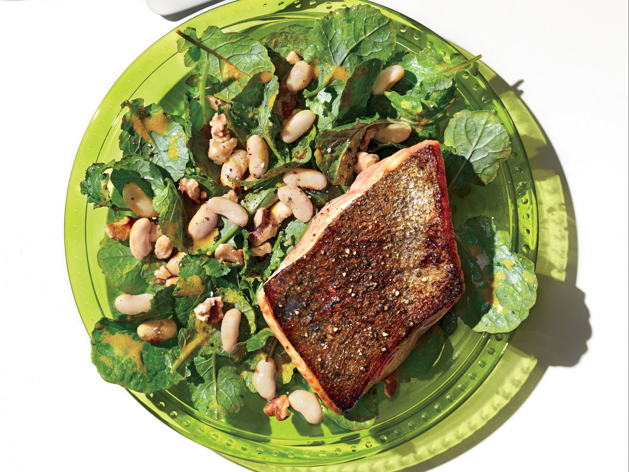 Salmon with Kale, Walnut, and White Bean Salad