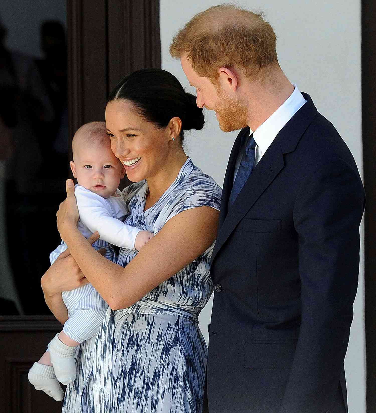 Prince Harry and Meghan, Duchess of Sussex, holding their son Archie
