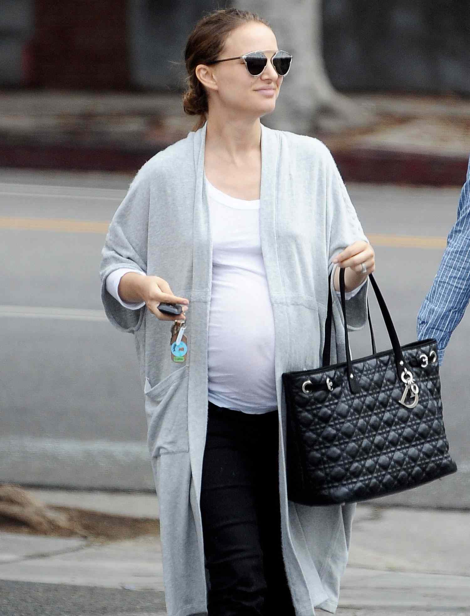Pregnant Natalie Portman shows off her huge baby bump