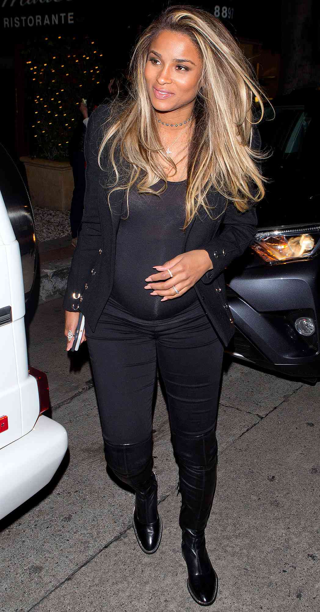 EXCLUSIVE: Ciara shows off her burgeoning baby bump as she leaves 'Madeo' Italian Restaurant with friends in West Hollywood, CA