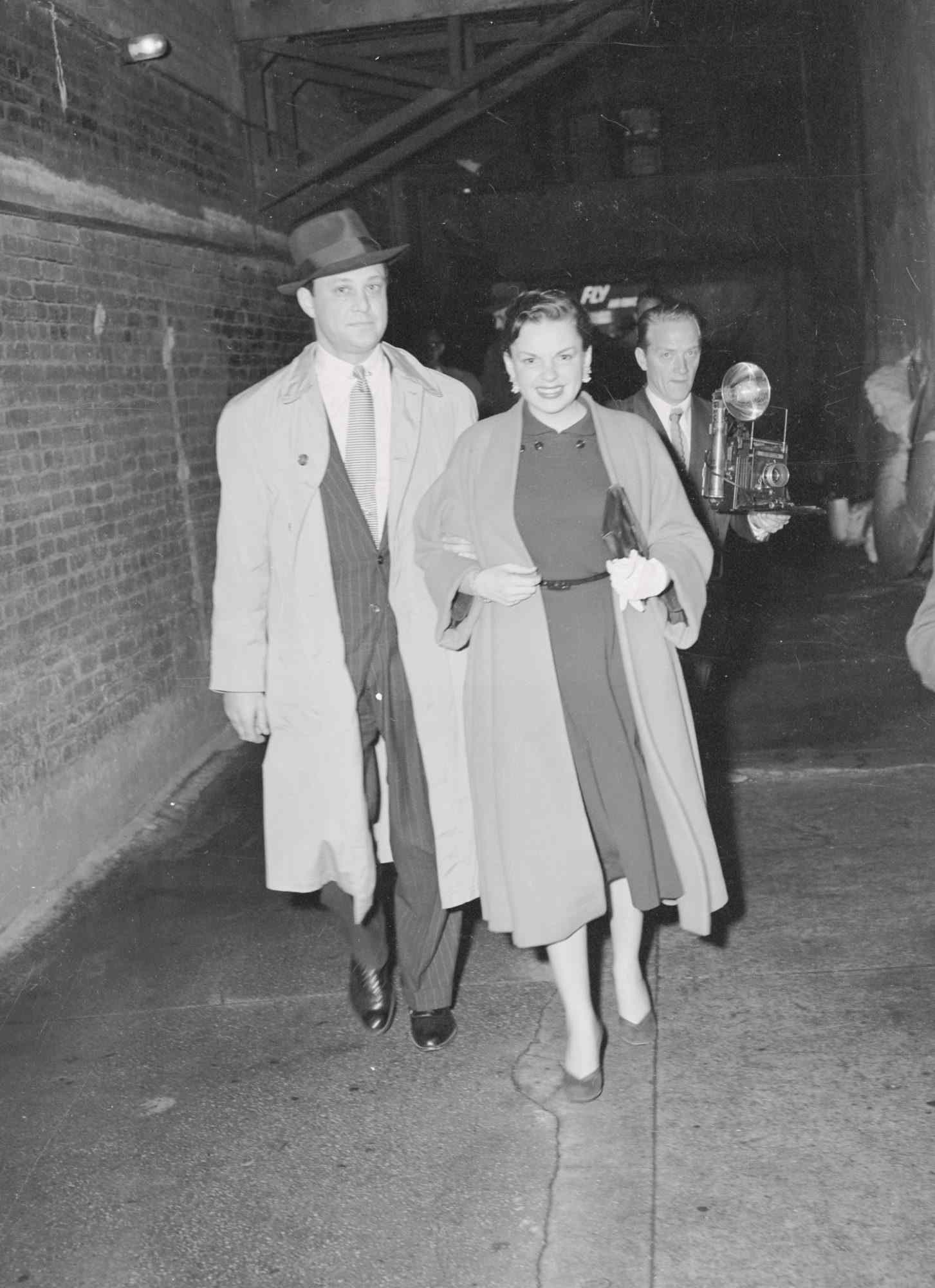 Judy Garland and Sid Luft Entering Theater Entrance