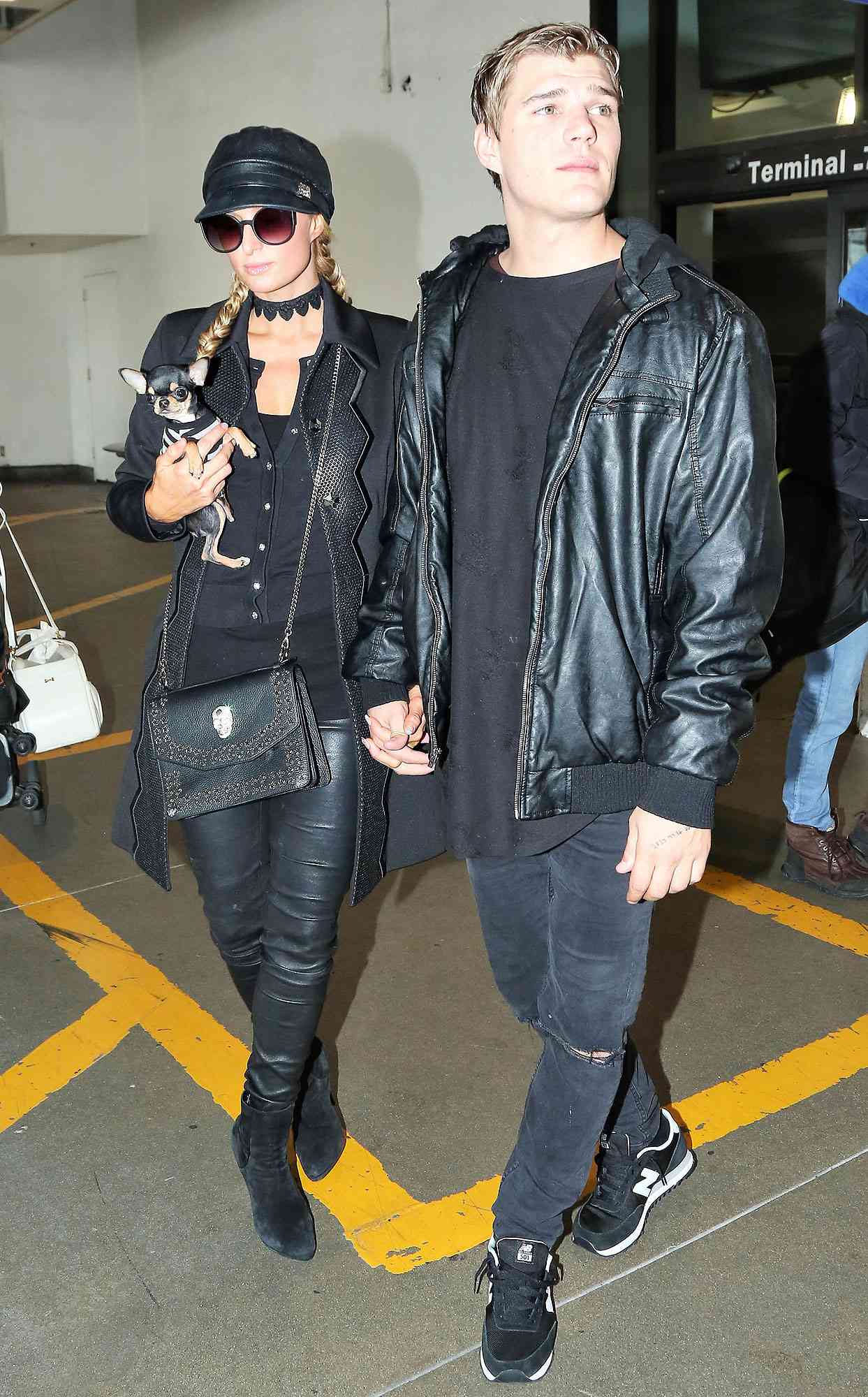 Paris Hilton and Chris Zylka at LAX Airport