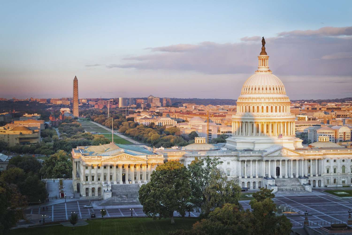 US Capitol Building, National Mall and Northwest Washington at sunrise from Library of Congress, Washington DC, USA