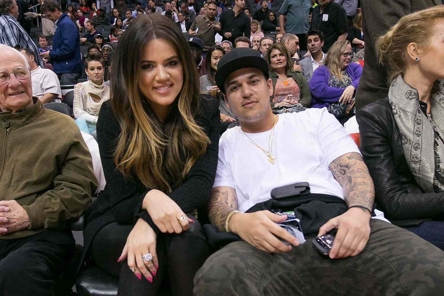 Khloe Kardashian-Odom and Rob Kardashian attend the Clippers gam
