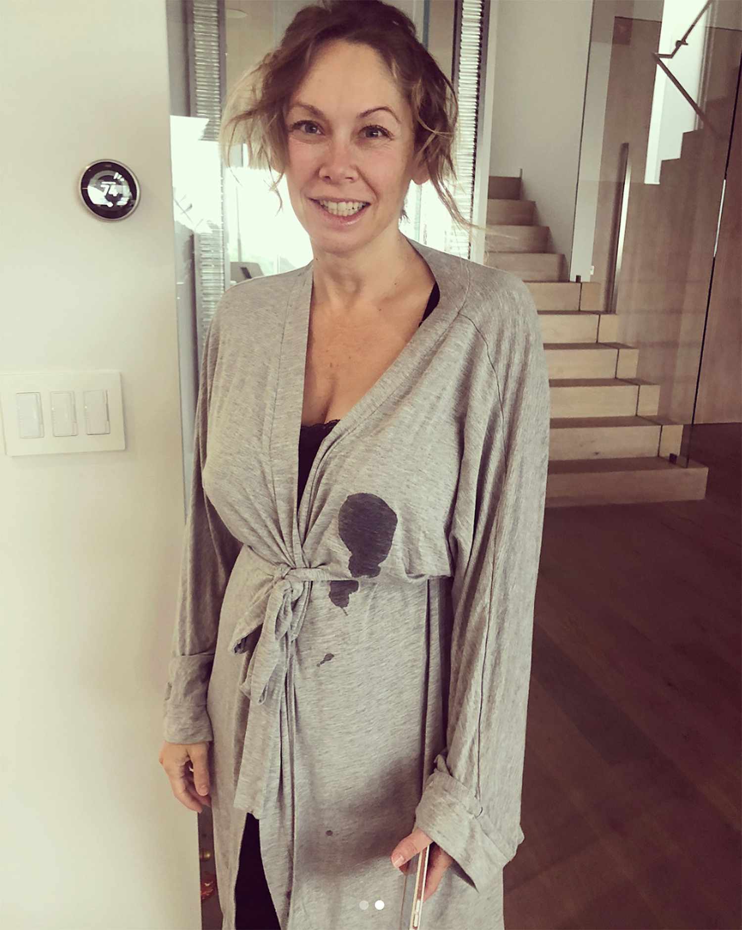 KYM JOHNSON HERJAVEC WITH A 'VERY REAL NEW MOM' MOMENT