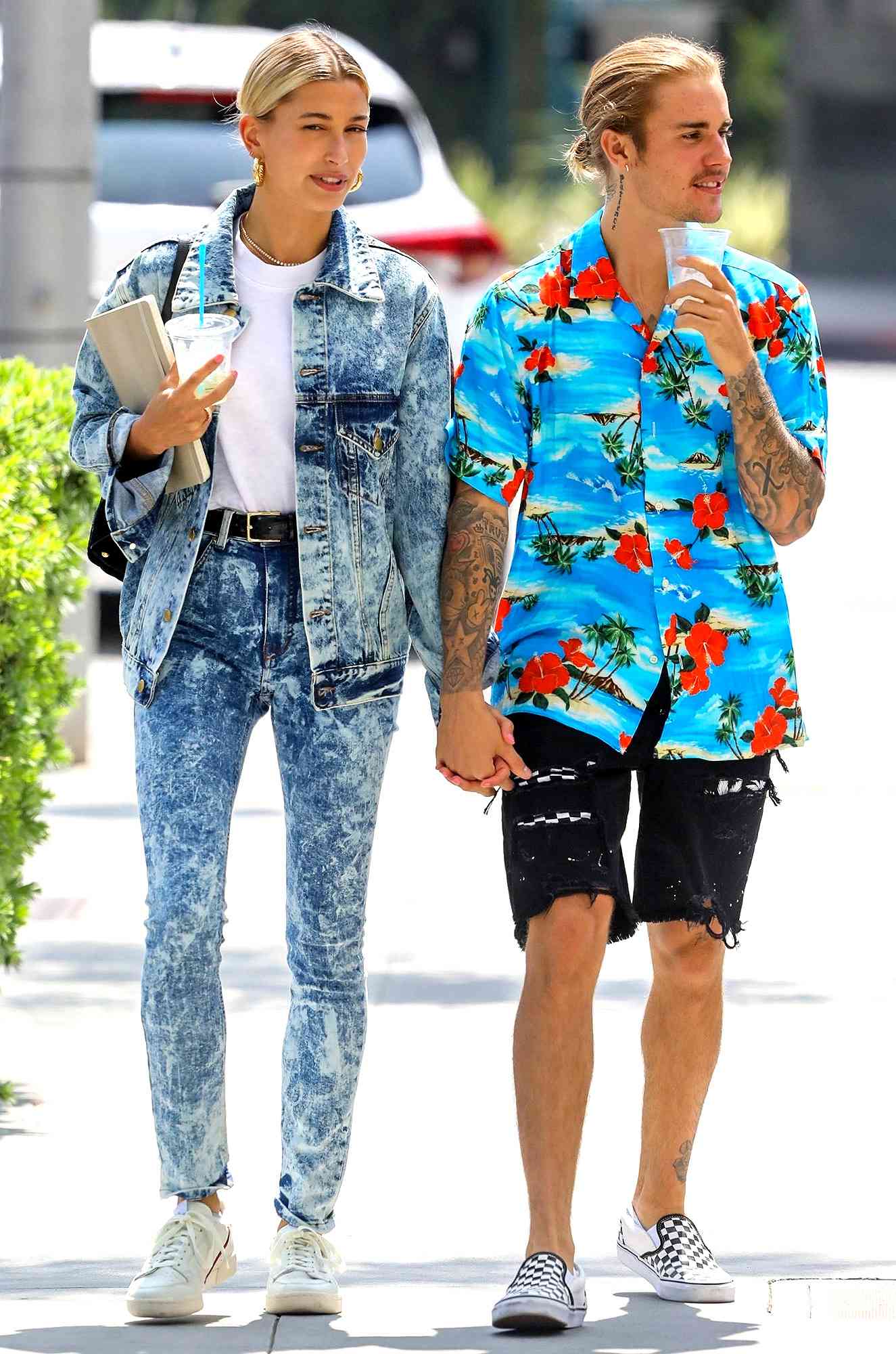 Justin Bieber and Hailey Baldwin hold hands as they walk in Beverly Hills