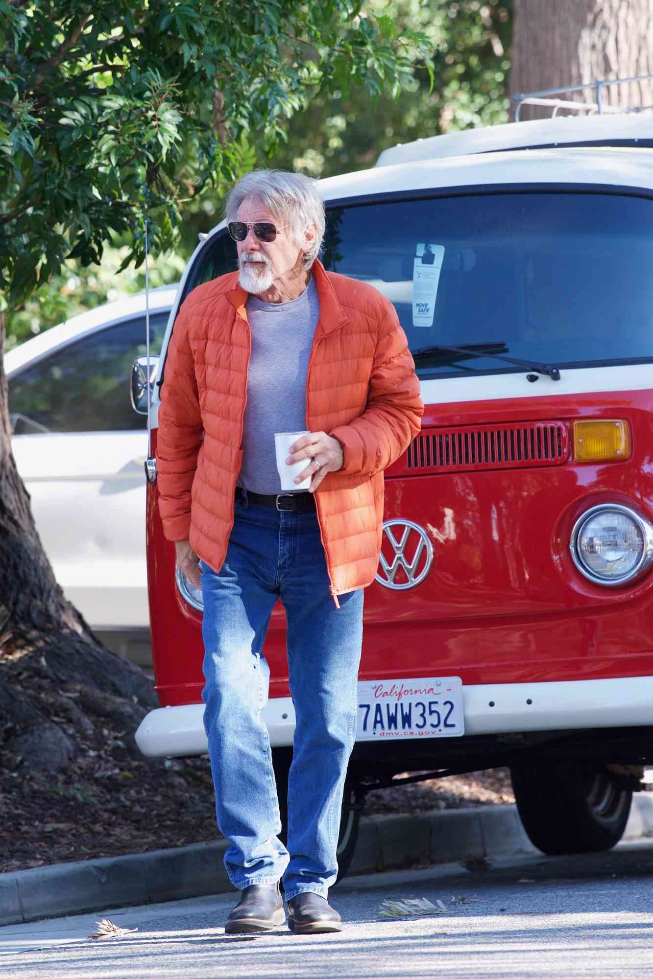 EXCLUSIVE: Harrison Ford make quick stop to check a  car that was for sale.