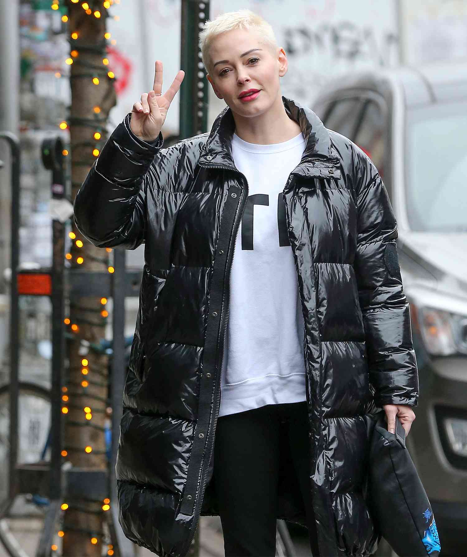 Actress Rose McGowan Flashes The Peace Sign In New York City.