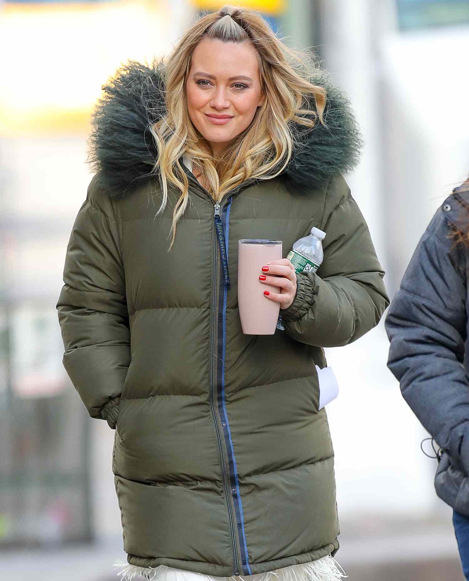 Hilary Duff is all smiling as walking to the 'Younger' set in the west village, New York City