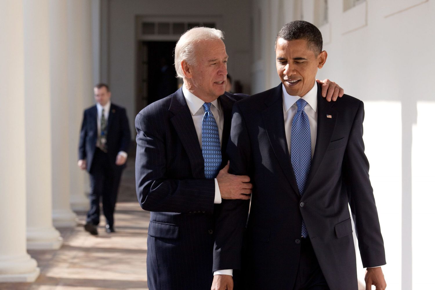 Barack Obama walks with Vice President Joe Biden