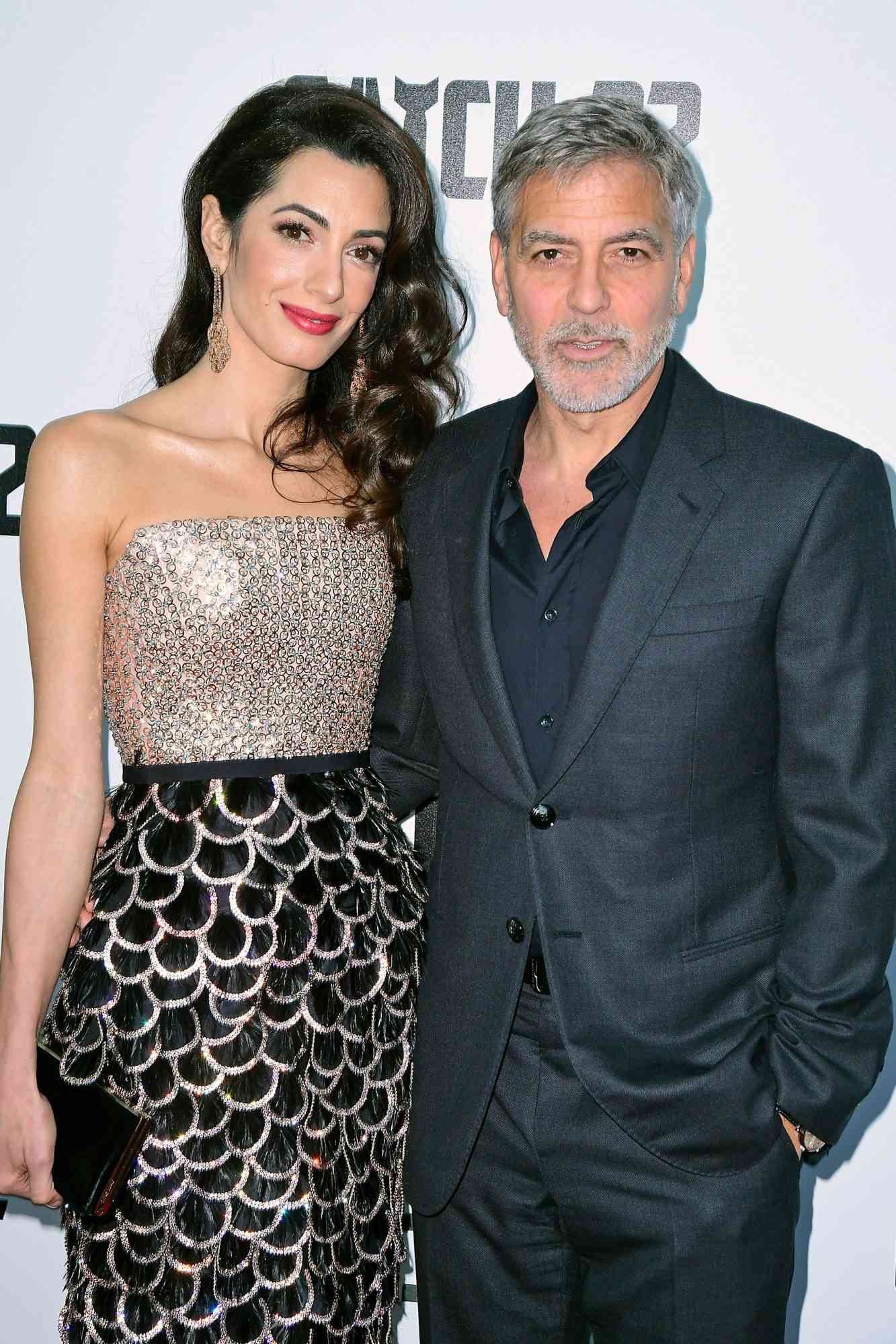 Amal Clooney (left) and George Clooney