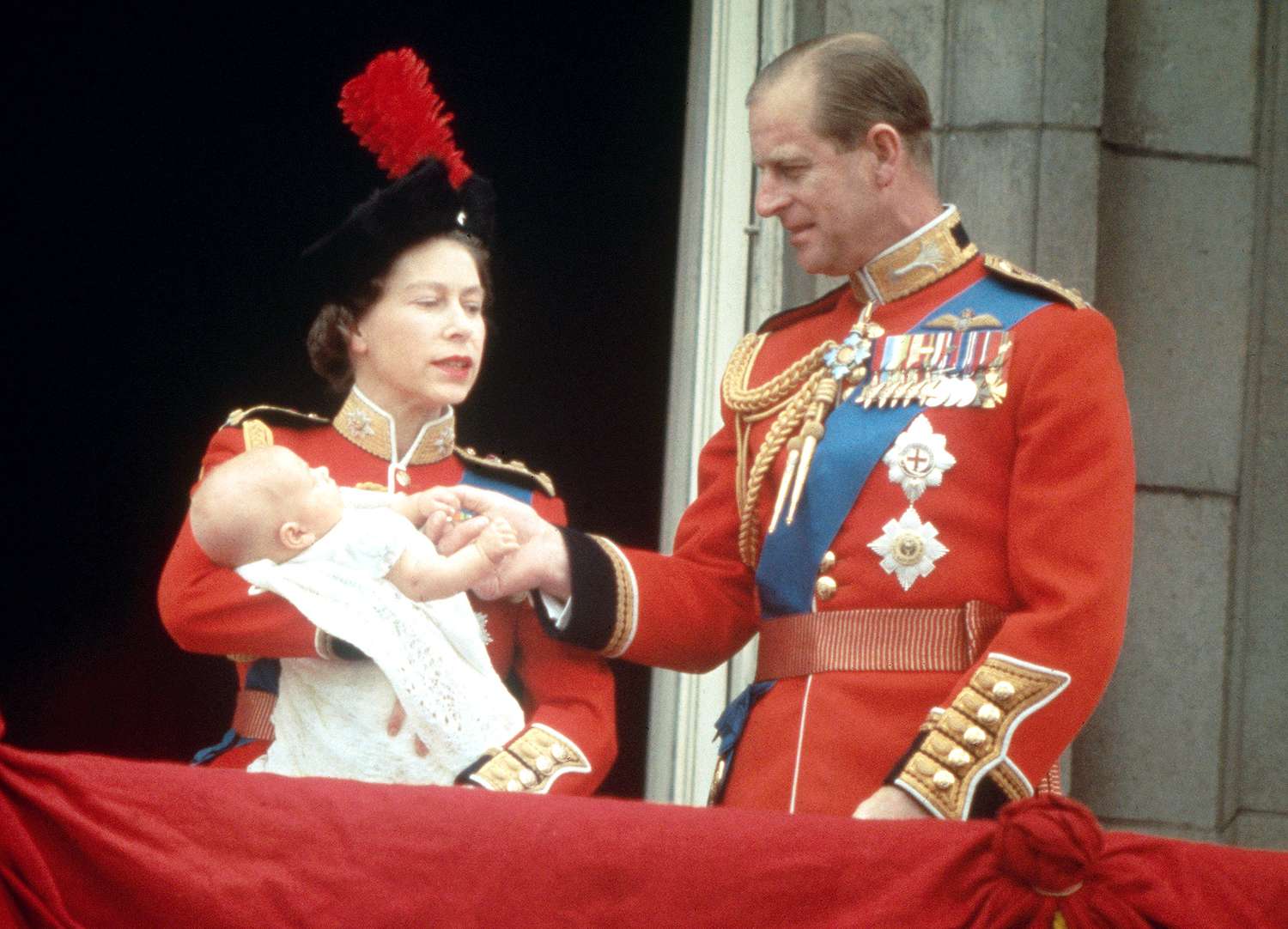Queen Elizabeth II and Prince Philip with their baby son, Prince Edward