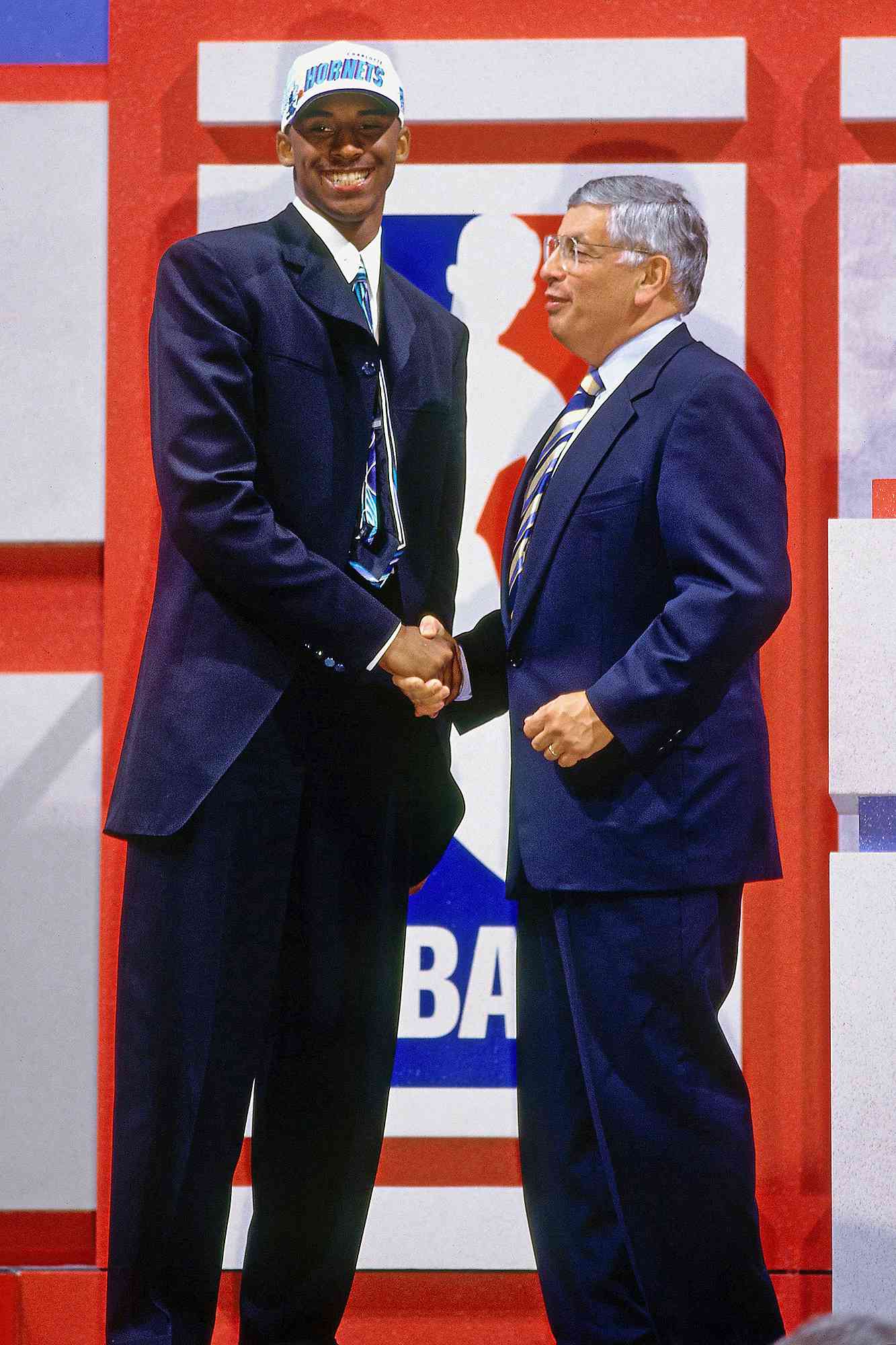 Kobe Bryant poses with NBA Commissioner David Stern