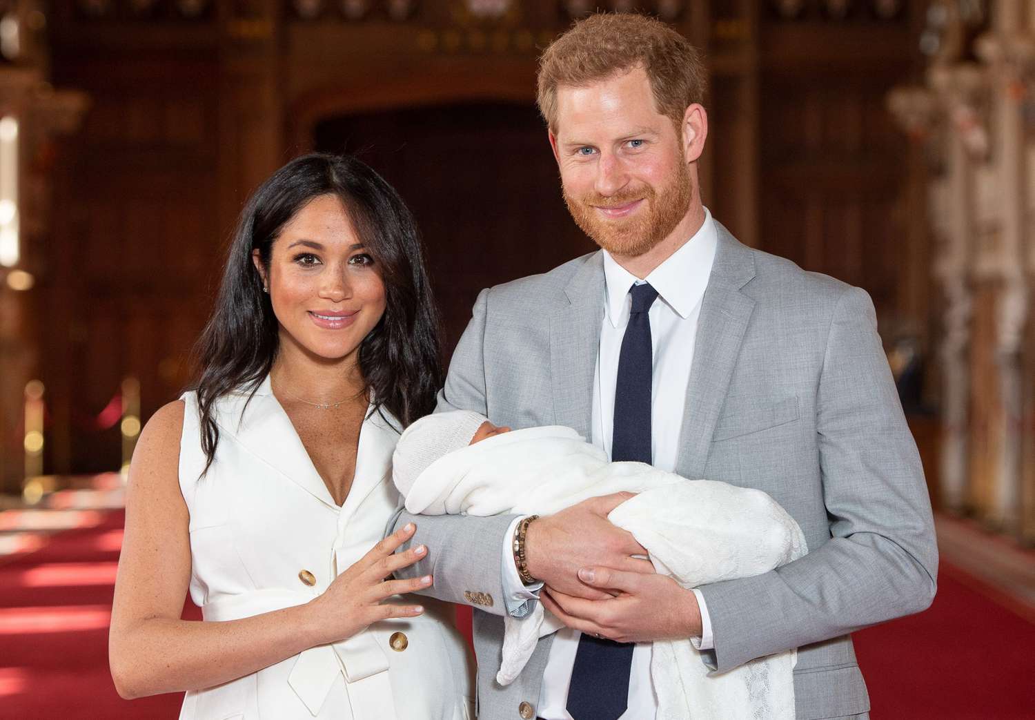 Prince Harry, Duke of Sussex and Meghan, Duchess of Sussex, pose with their newborn son Archie