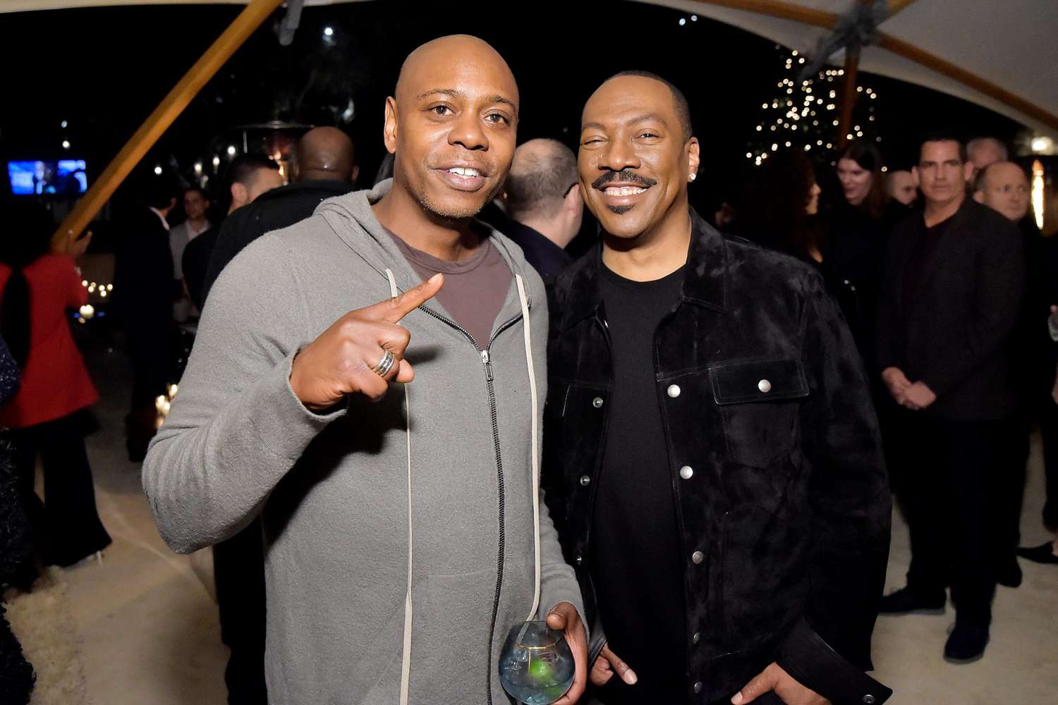Dave Chappelle and Eddie Murphy attend Celebrate the Season: Ted's Holiday Toast at Private Residence on November 15, 2019 in Beverly Hills, California