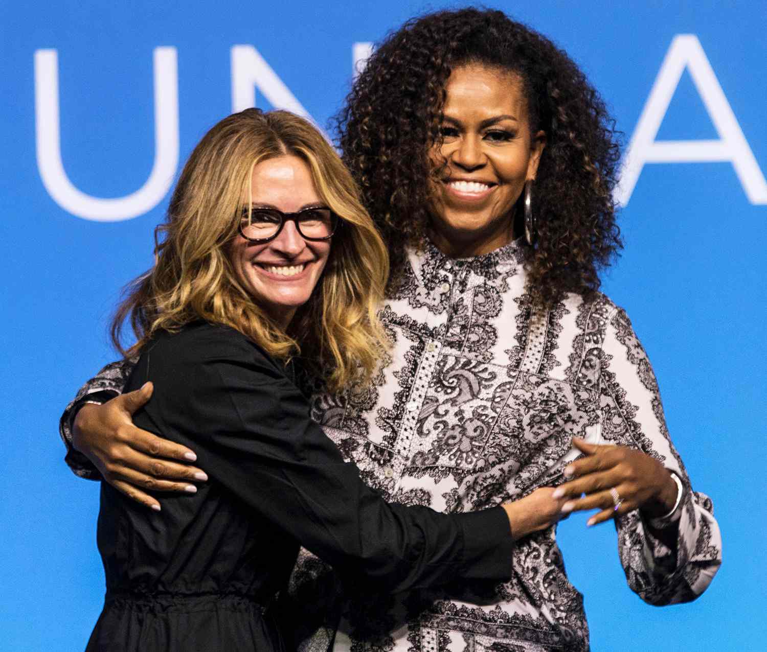 Former US first lady Michelle Obama (R) hugs US actress Julia Roberts at the end of an Obama Foundation event in Kuala Lumpur, Malaysia, 12 December 2019. Obama Foundation event in Kuala Lumpur, Malaysia - 12 Dec 2019