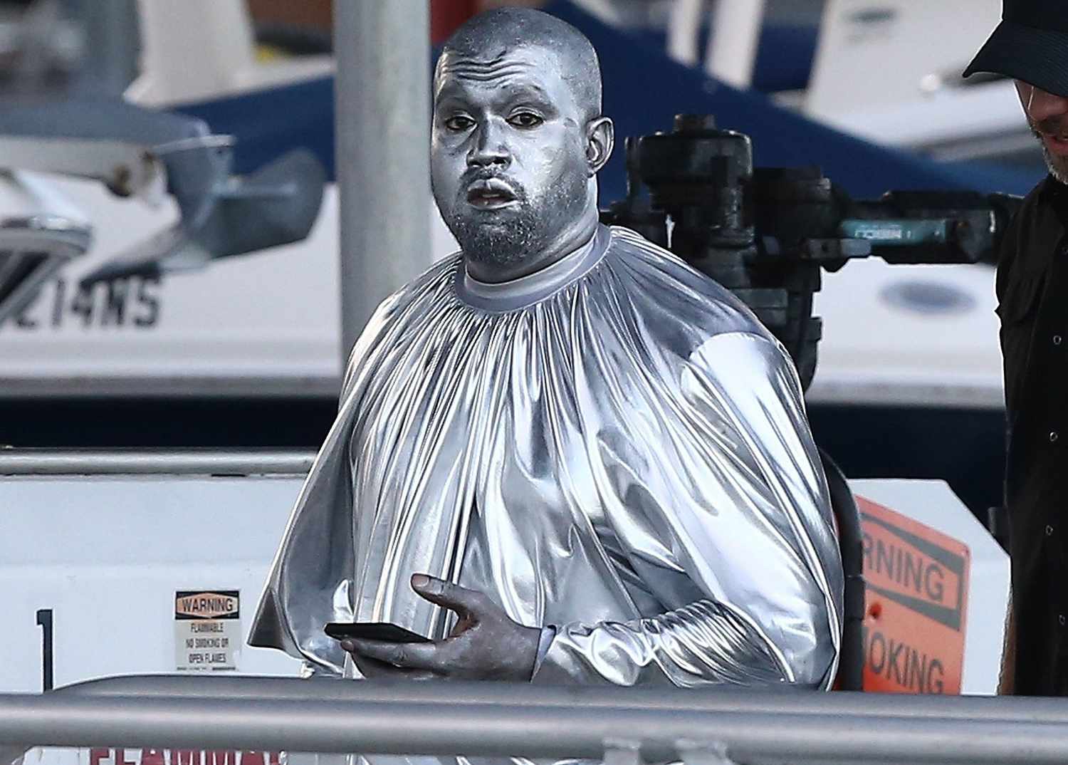 Kanye West silver body paint
