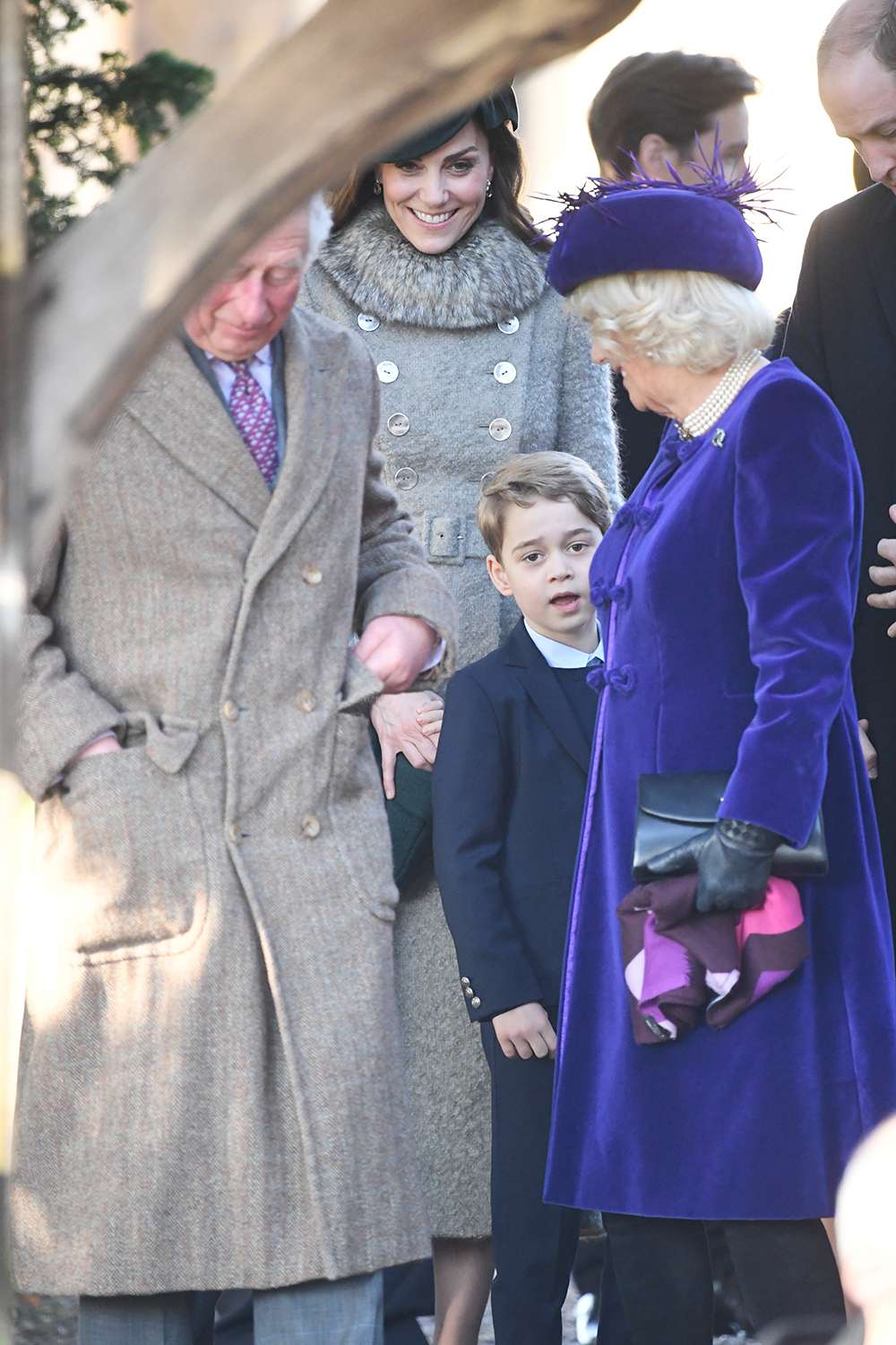 The Prince of Wales, the Duchess of Cambridge, Prince George and the Duchess of Cornwall after attending the Christmas Day morning church service at St Mary Magdalene Church in Sandringham, Norfolk. (Photo by Joe Giddens/PA Images via Getty Images)