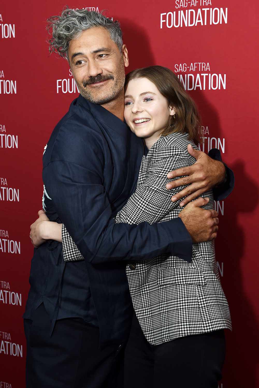 Taika Waititi (L) and actress Thomasin McKenzie attend the SAG-AFTRA Foundation Conversations with "JoJo Rabbit" at the SAG-AFTRA Foundation Screening Room on January 08, 2020