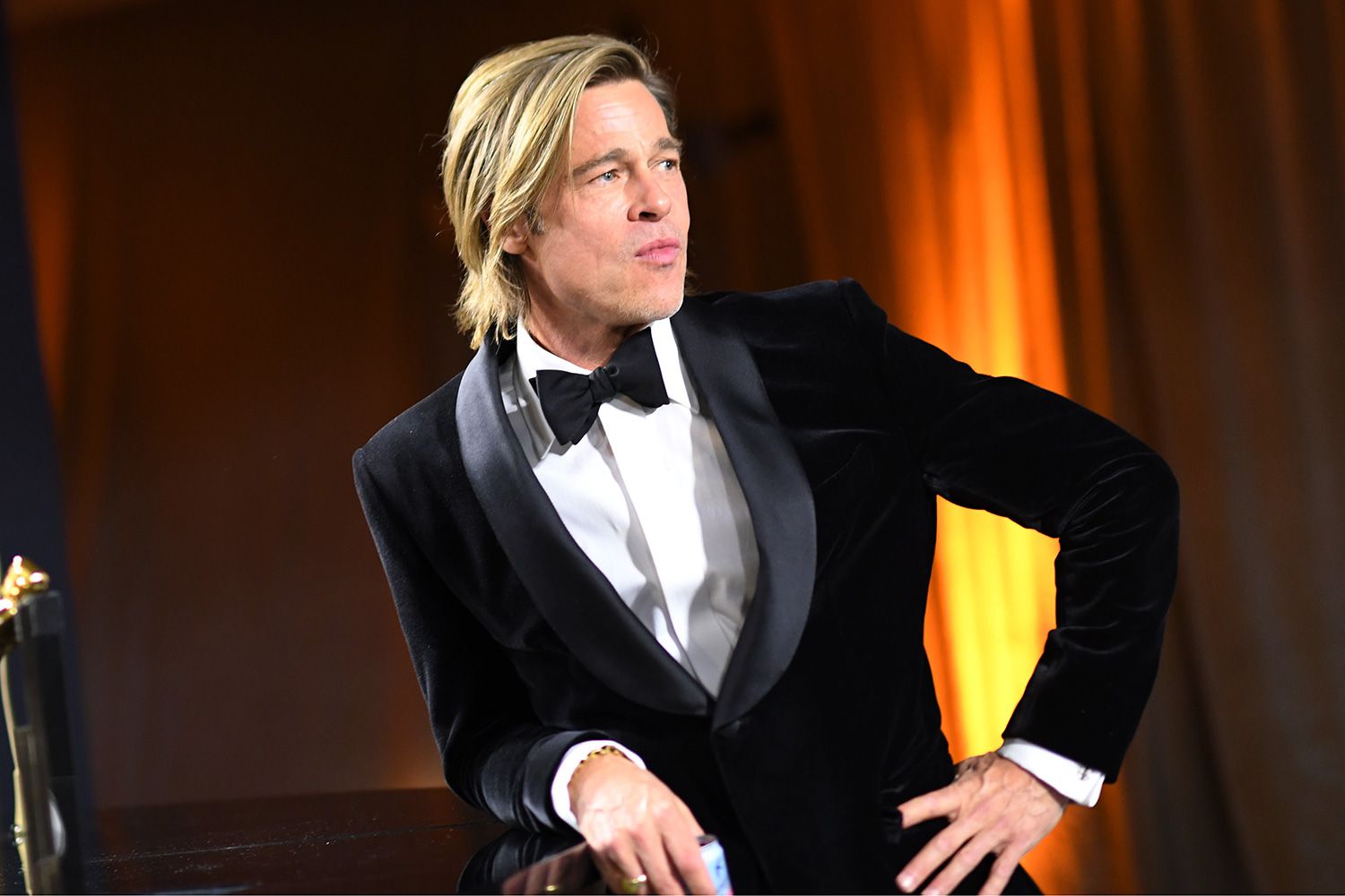 Brad Pitt waits for his award for Best Actor in a Supporting Role to be engraved as he attends the 92nd Oscars Governors Ball at the Hollywood & Highland Center in Hollywood, California on February 9, 2020