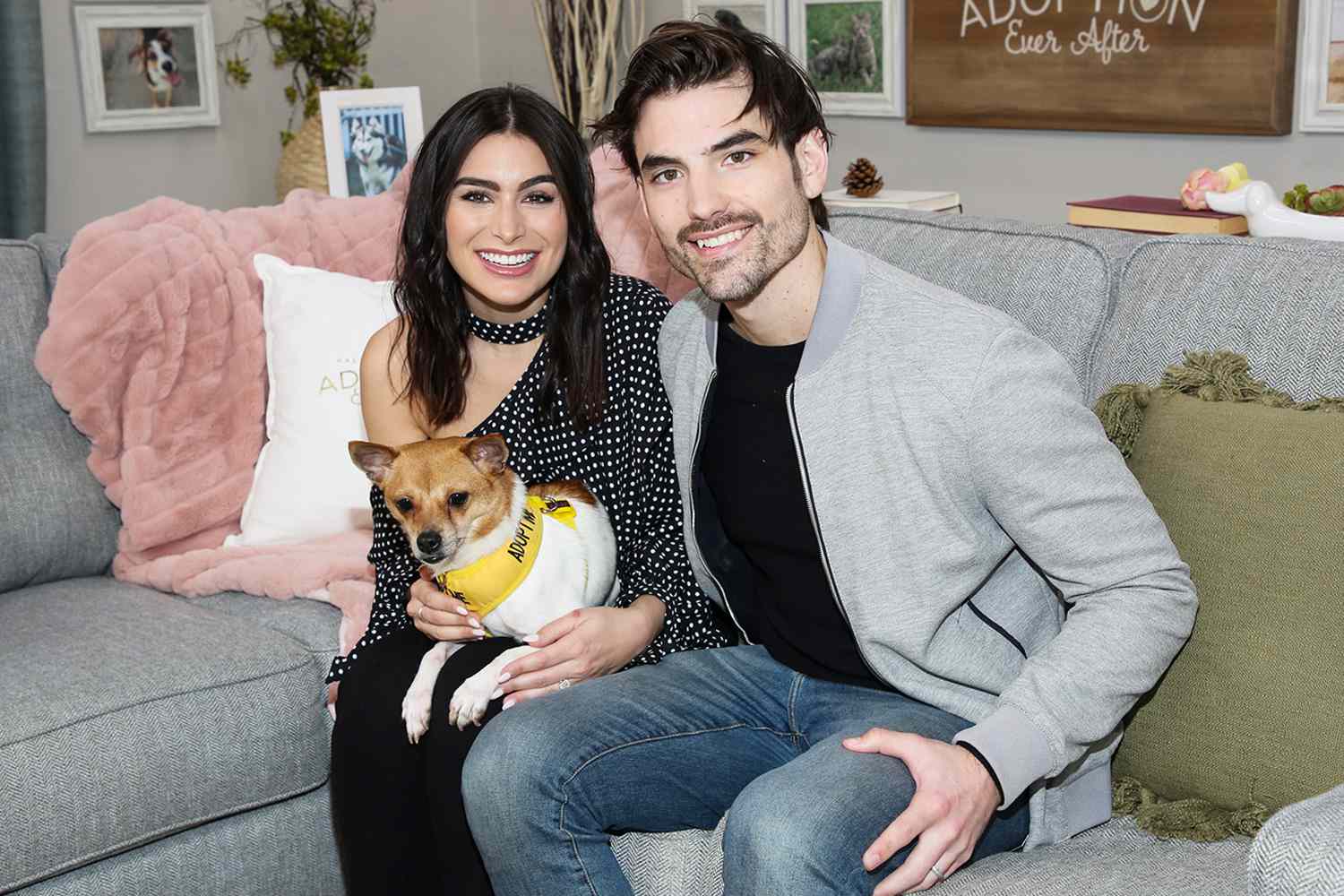 Ashley Iaconetti Haibon (L) and Jared Haibon pose with a rescue dog on the set of Hallmark Channel's "Home & Family" at Universal Studios Hollywood on February 20, 2020 in Universal City, California