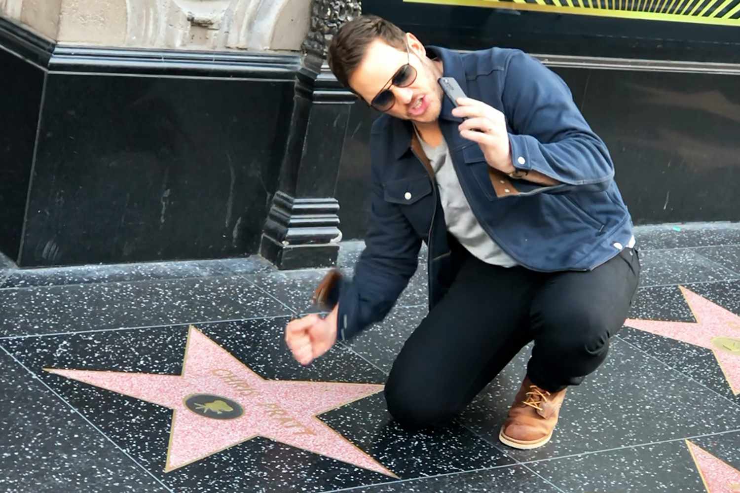 Chris Pratt visits his star on the 'Hollywood Walk of Fame' and plays with Security dog in Hollywood, California