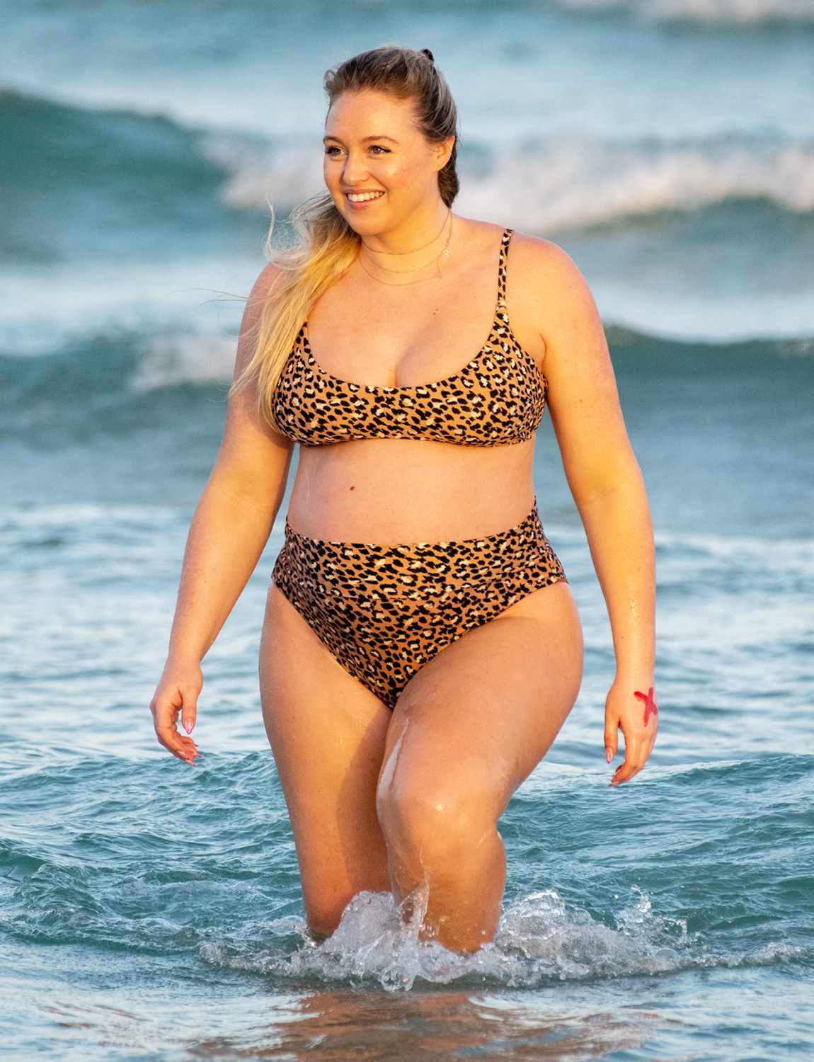 Iskra Lawrence takes a sunset dip in Miami Beach