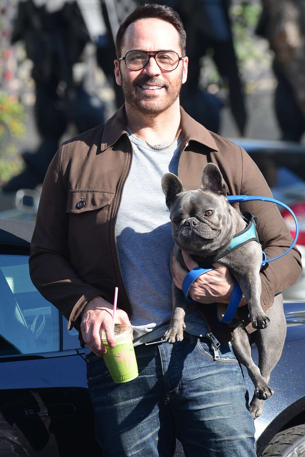Jeremy Piven plants a kiss on his French Bulldog Bubba while out running errands West Hollywood, Ca