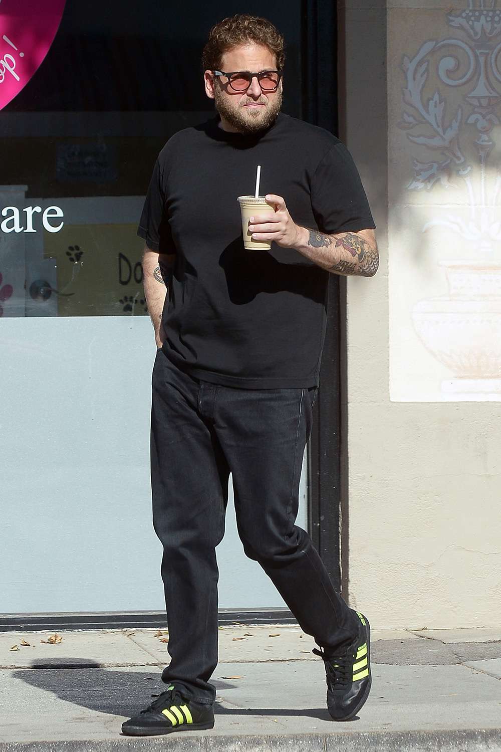 Jonah Hill shows off a leaner figure while out on a coffee run in Los Angeles