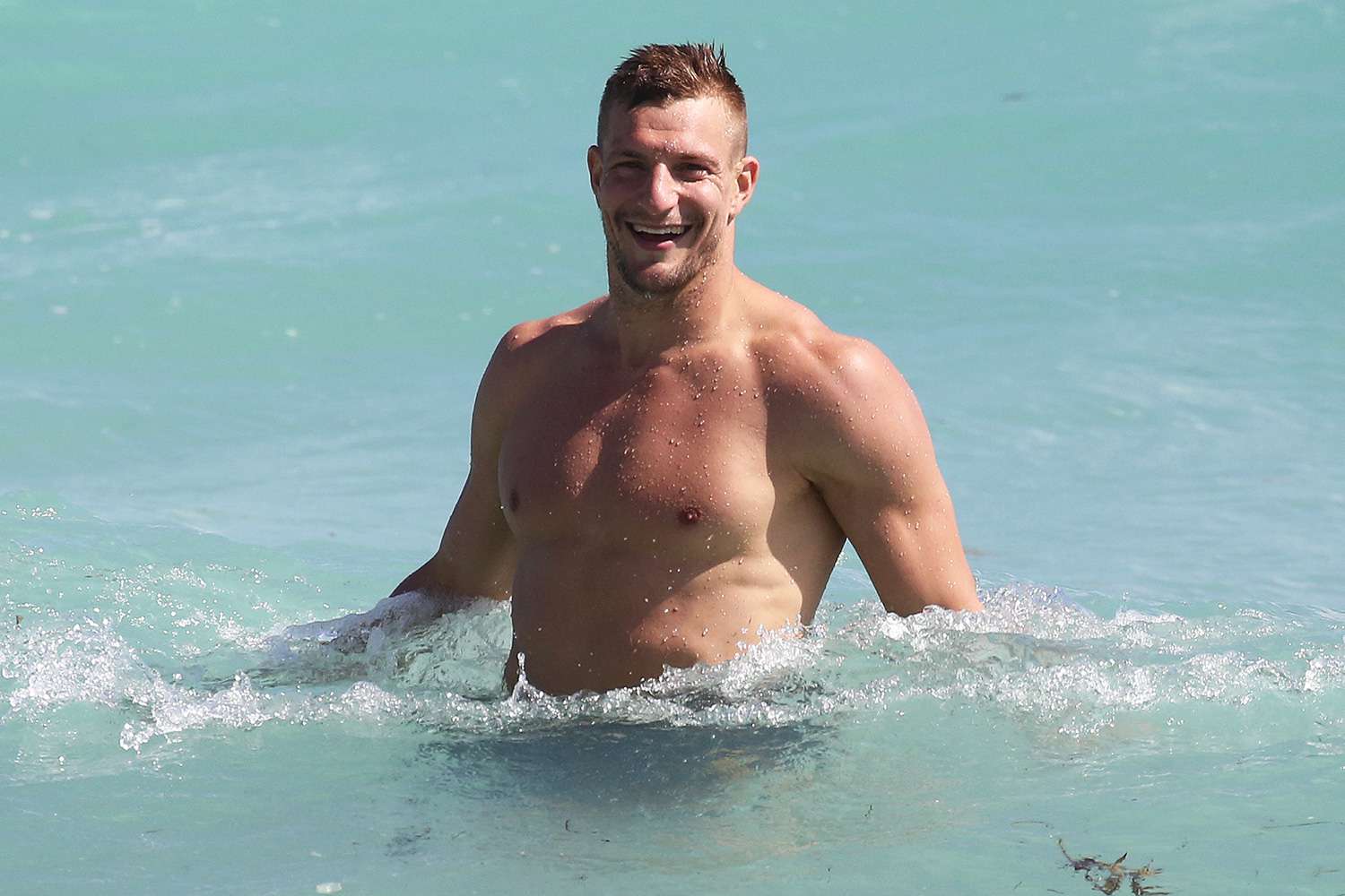 Rob Gronkowski takes a dip in the ocean in Miami. 12 Feb 2020