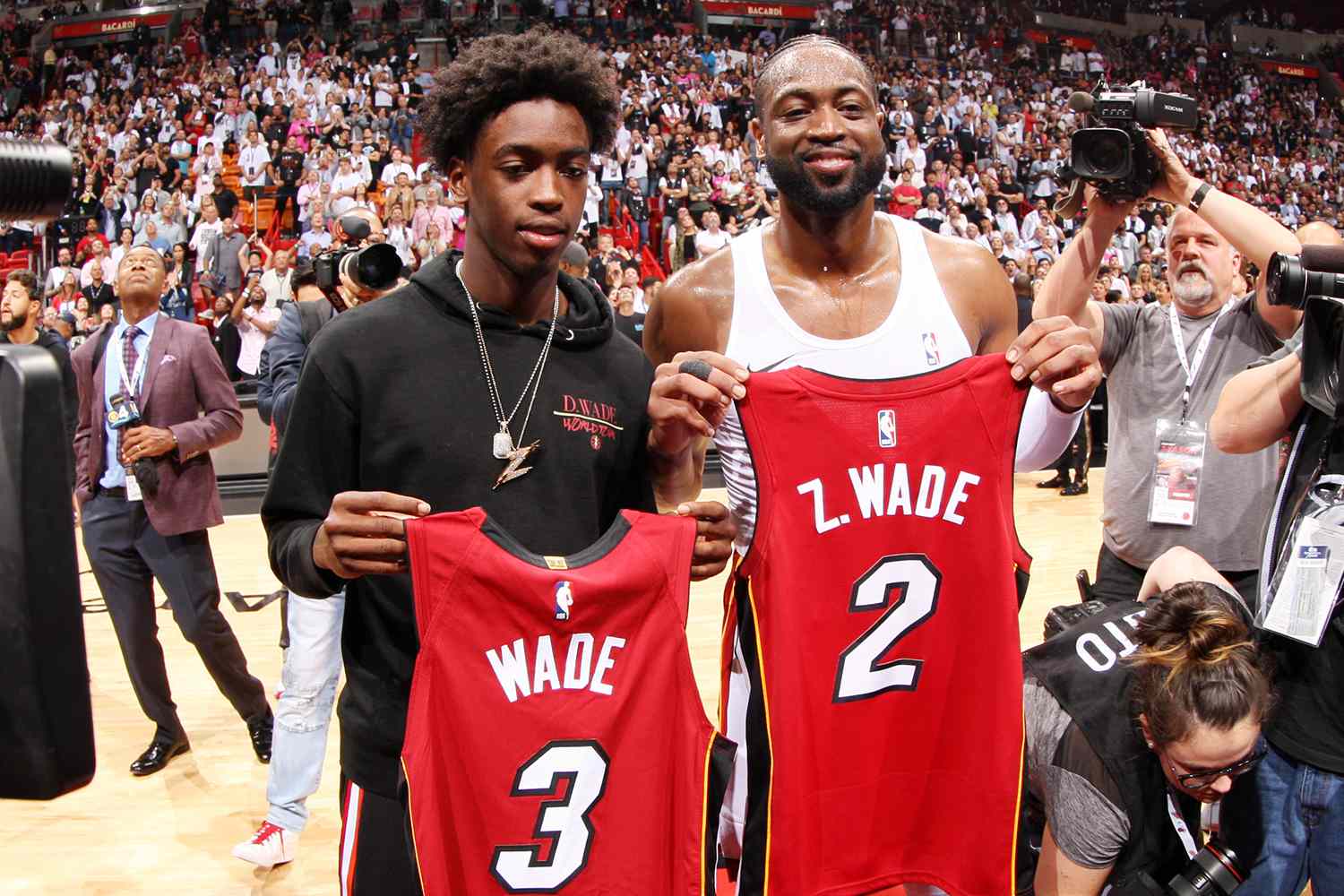Dwyane Wade #3 of the Miami Heat and son Zaire pose for a photo following the game against the Philadelphia 76ers on April 9, 2019 at American Airlines Arena in Miami, Florida