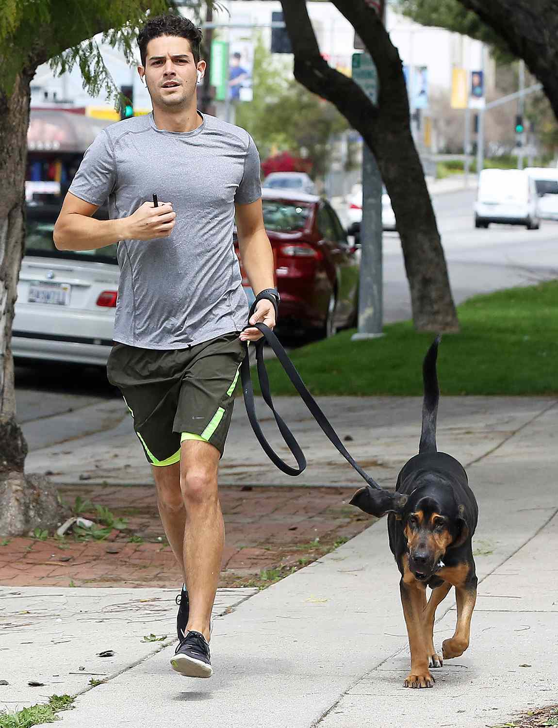 Wells Adams braves the Corona virus while out for a run with dog