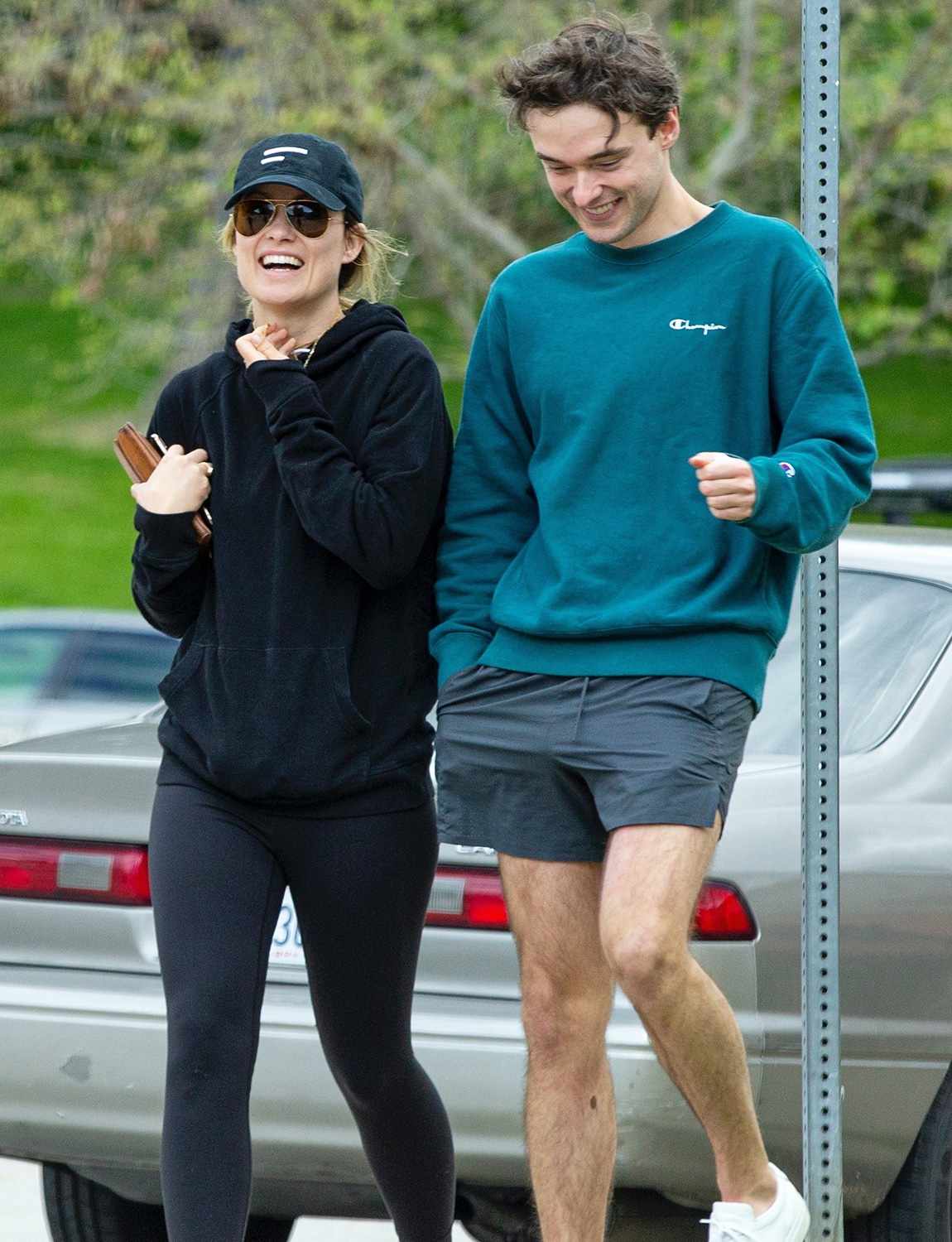 Olivia Wilde takes a stroll with her little bro Charlie Cockburn