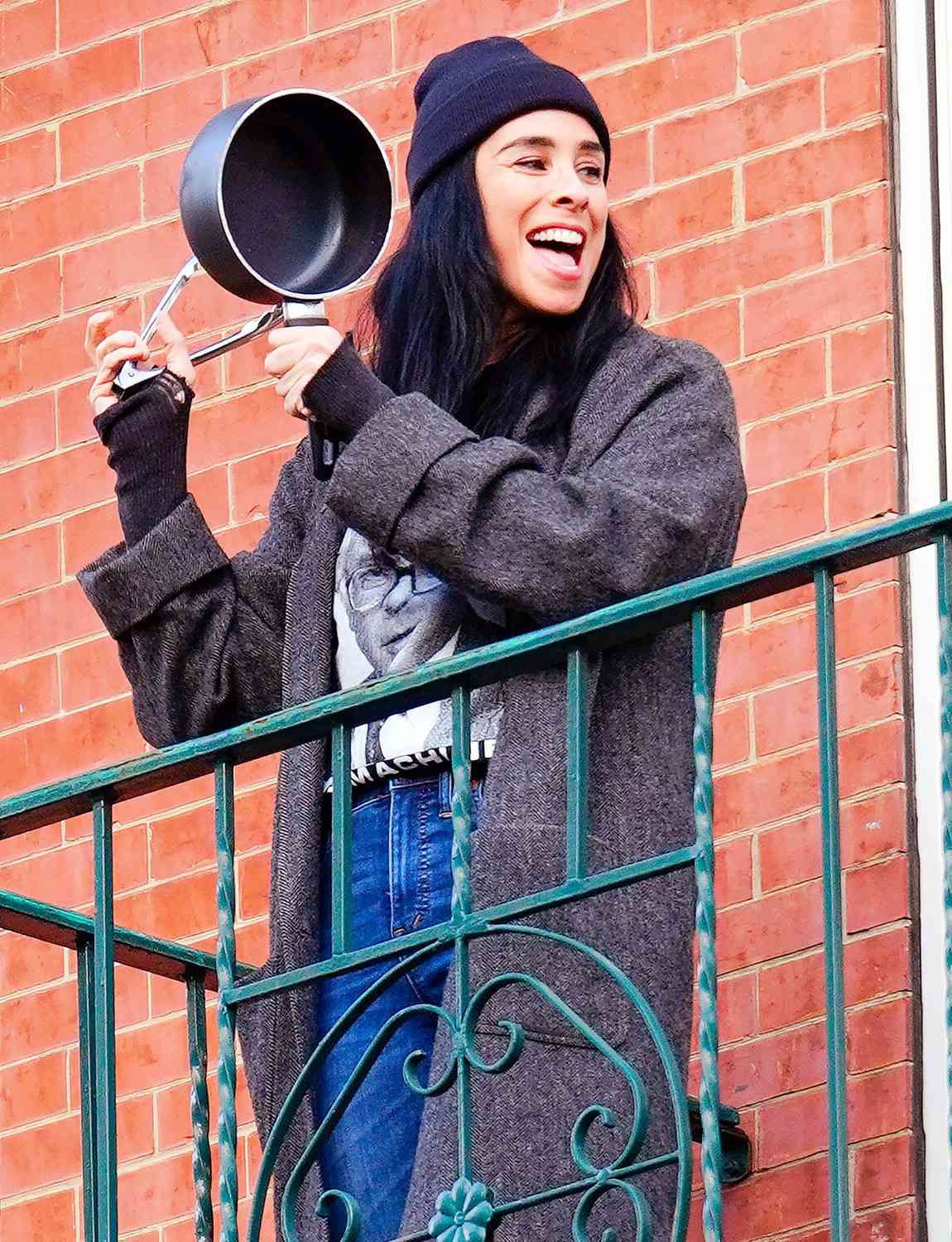 Sarah Silverman cheers on front line workers from a balcony on April 20, 2020 in New York City
