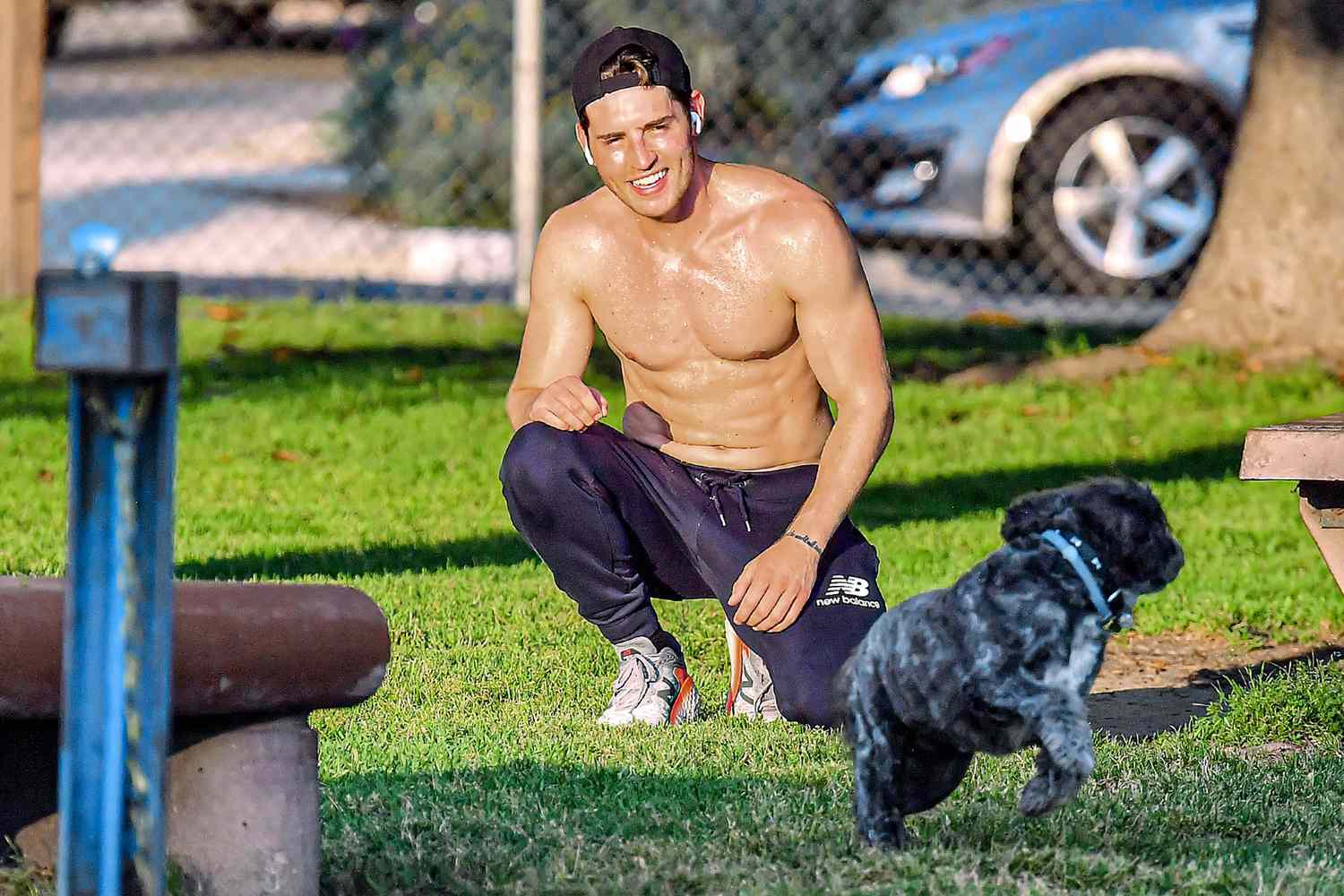 Gregg Sulkin shows shows off his ripped body while working out shirtless in a park in Los Angeles, CA.