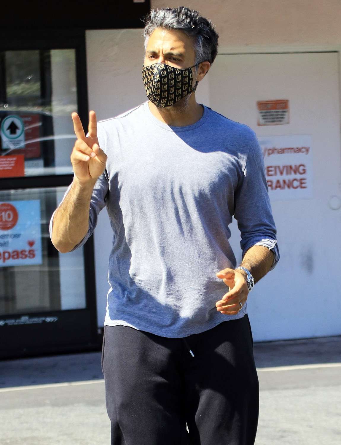 Jaime Camil stops by CVS in Studio City wearing a mask