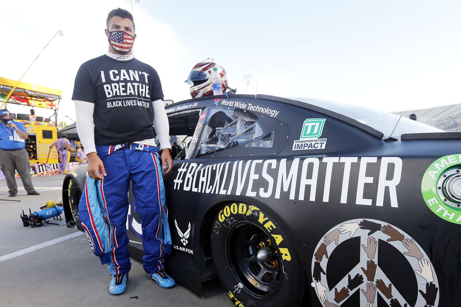 Driver Bubba Wallace waits for the start of a NASCAR Cup Series auto race, in Martinsville, Va NASCAR Auto Racing, Martinsville, United States - 10 Jun 2020
