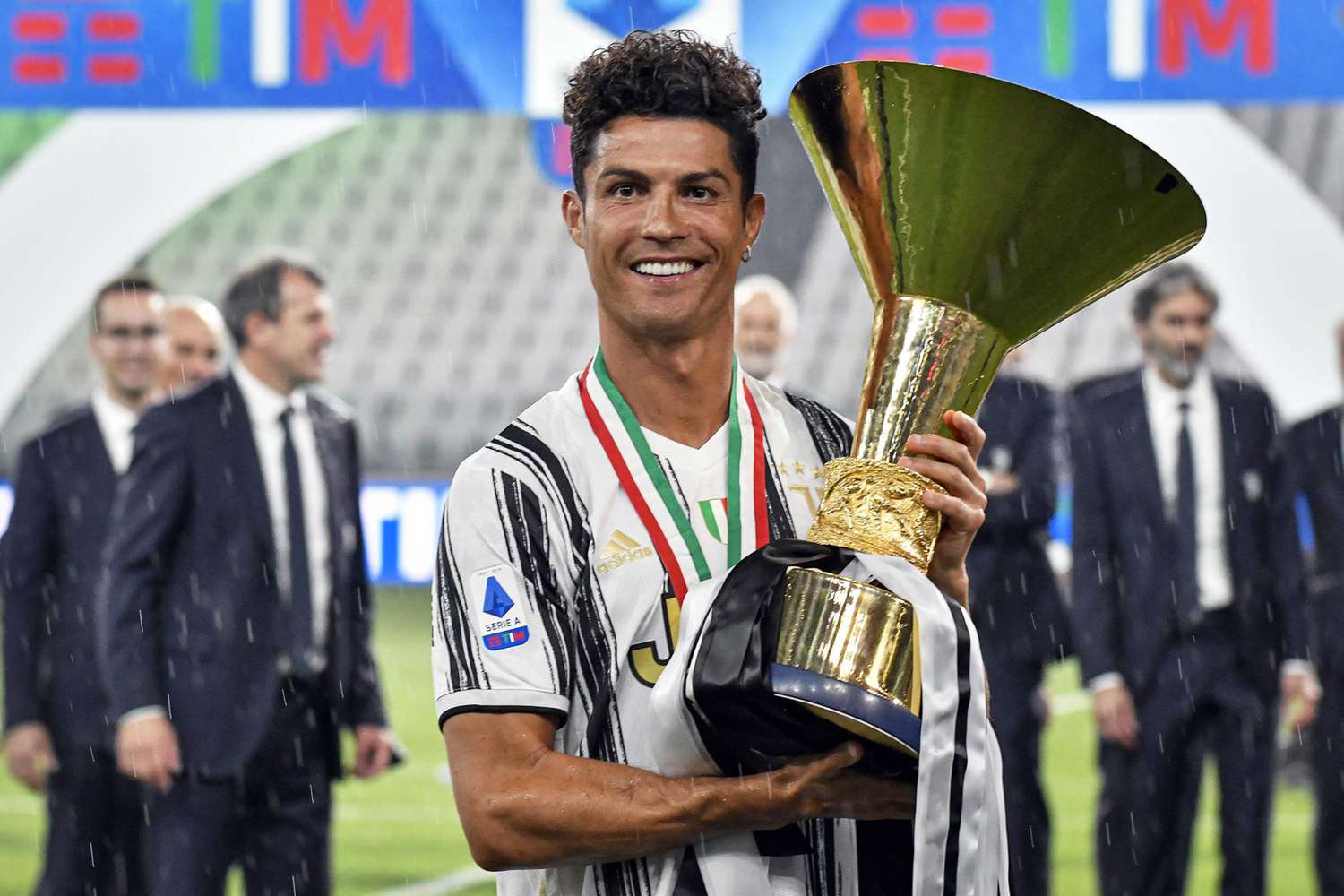 Cristiano Ronaldo of Juventus celebrates with the trophy Juventus v Roma