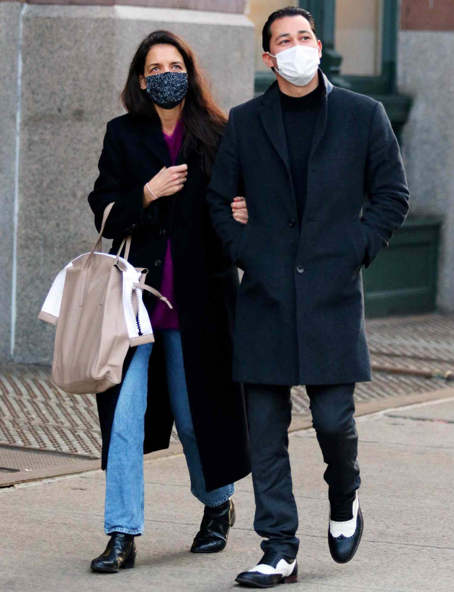 Katie Holmes and Emilio Vitolo Jr. are all smiles as they go on a romantic stroll after spending Christmas together in NYC