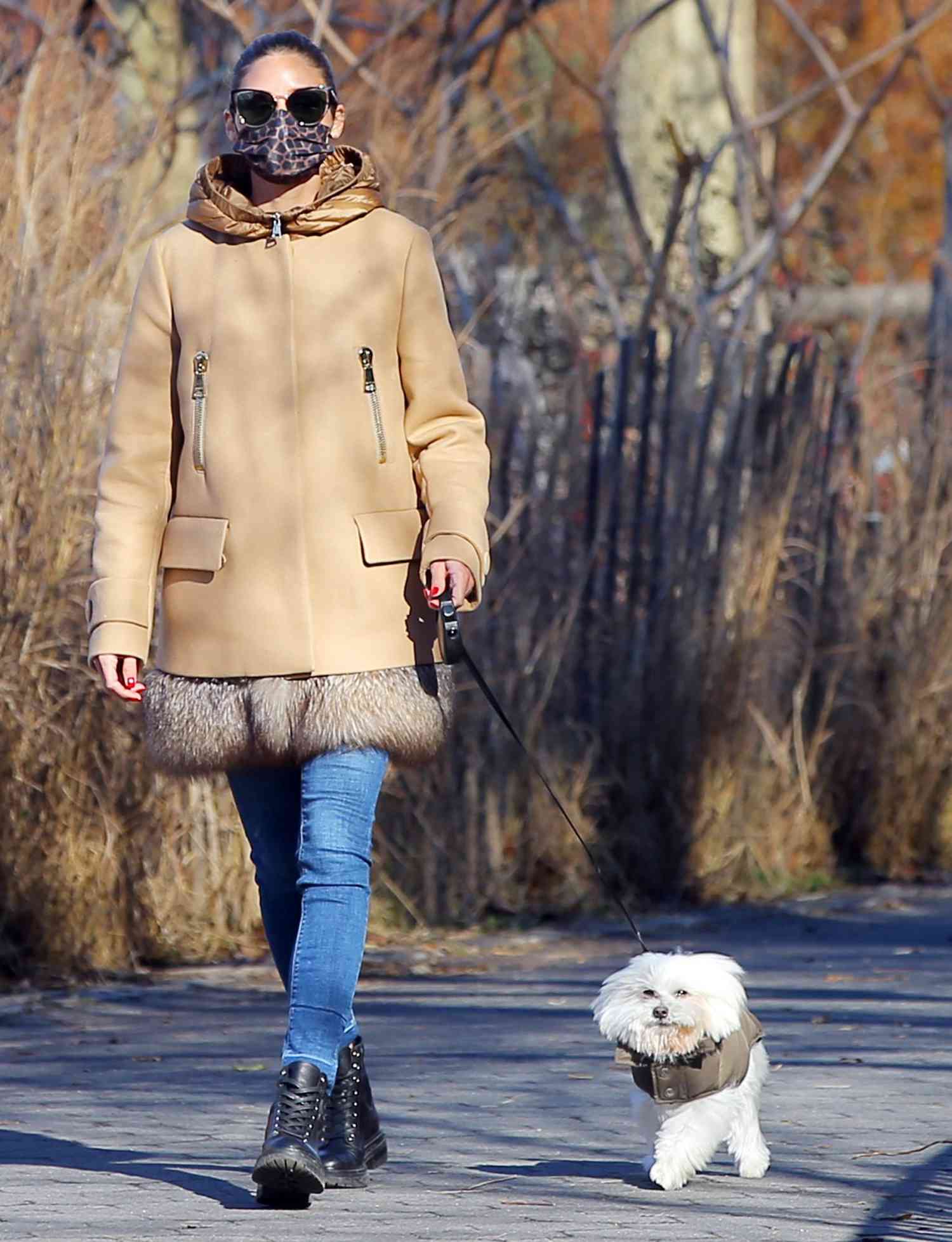 Olivia Palermo Walks Her Dog Mr. Butler Wearing A Fur-Trimmed Moncler Coat
