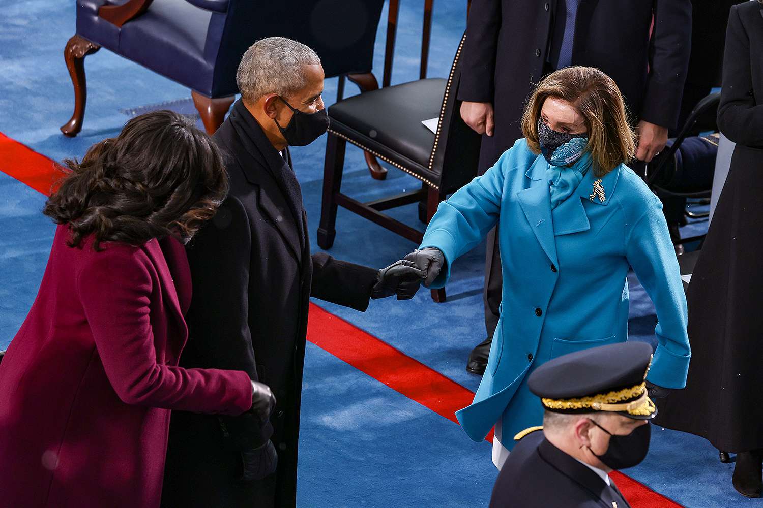 WASHINGTON, DC - JANUARY 20: Former U.S. President Barack Obama and former first lady Michelle Obama greet Speaker of the House Nancy Pelosi (D-CA) at the inauguration of U.S. President-elect Joe Biden on the West Front of the U.S. Capitol on January 20, 2021 in Washington, DC. During today's inauguration ceremony Joe Biden becomes the 46th president of the United States. (Photo by Tasos Katopodis/Getty Images)
