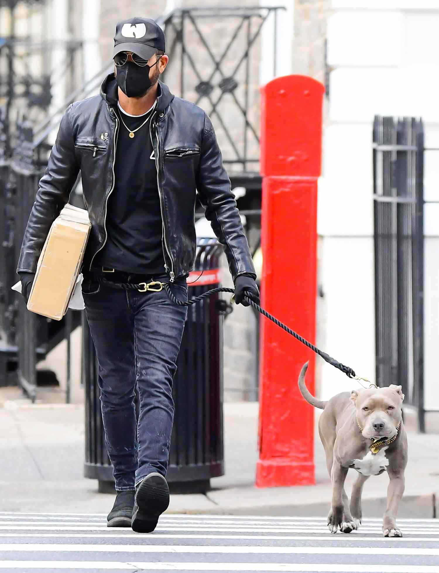 Justin Theroux is seen walking his dog in midtown on January 20, 2021 in New York City
