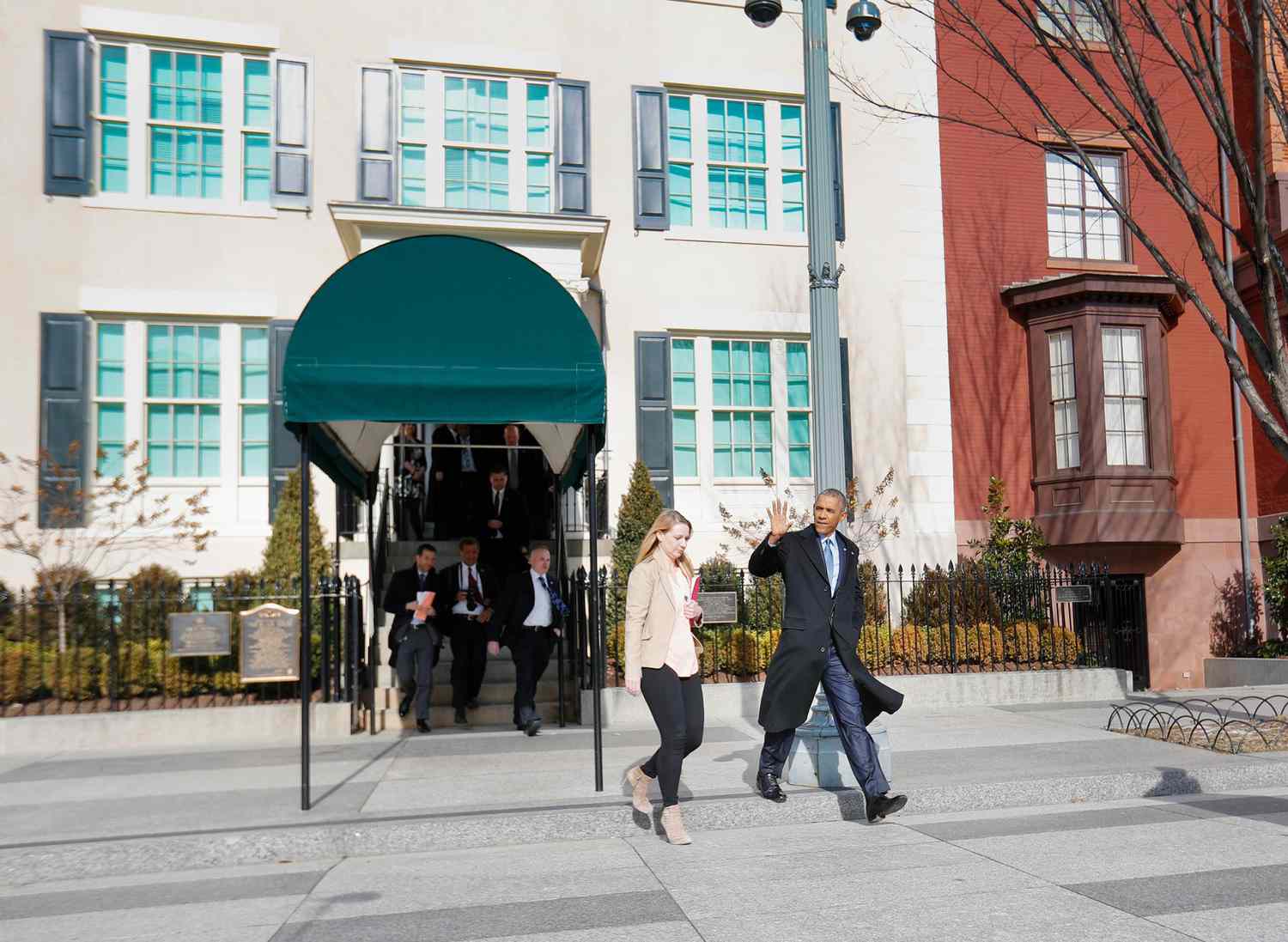 Barack Obama, Kristie Canegallo President Barack Obama waves to members of the media as he walks out of the Blair House and toward the White House in Washington