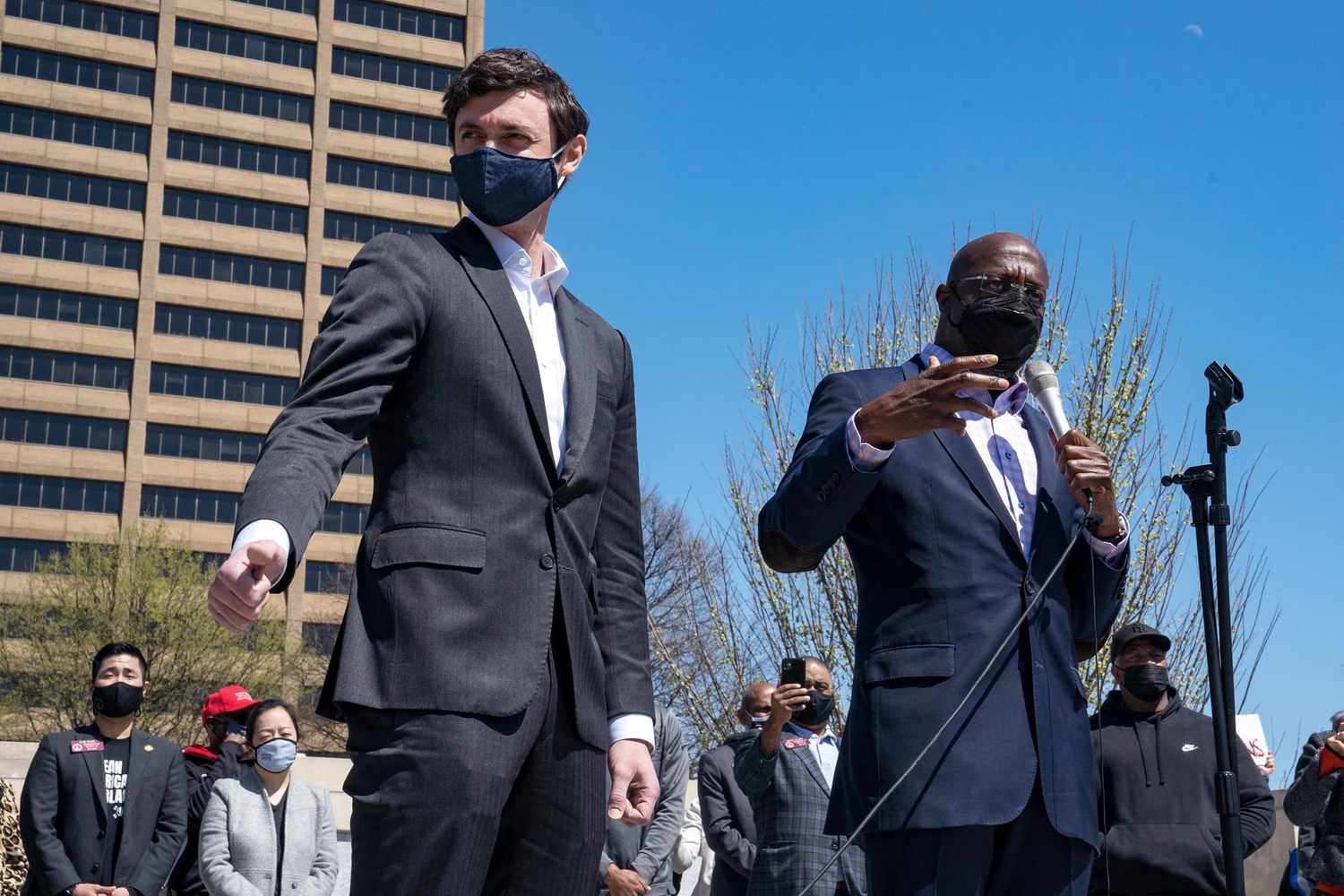 Sen. Jon Ossoff (D-GA) and Sen. Raphael Warnock (D-GA) speak to a group of demonstrators showing their support for Asian-American and Pacific Islander communities on March 20, 2021 in Atlanta, Georgia
