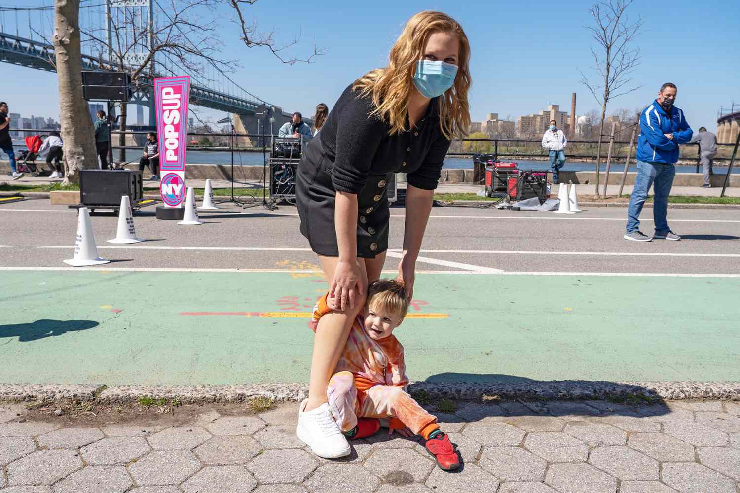 Amy Schumer and son Gene Fischer are seen in Astoria Park in Queens Borough of New York City