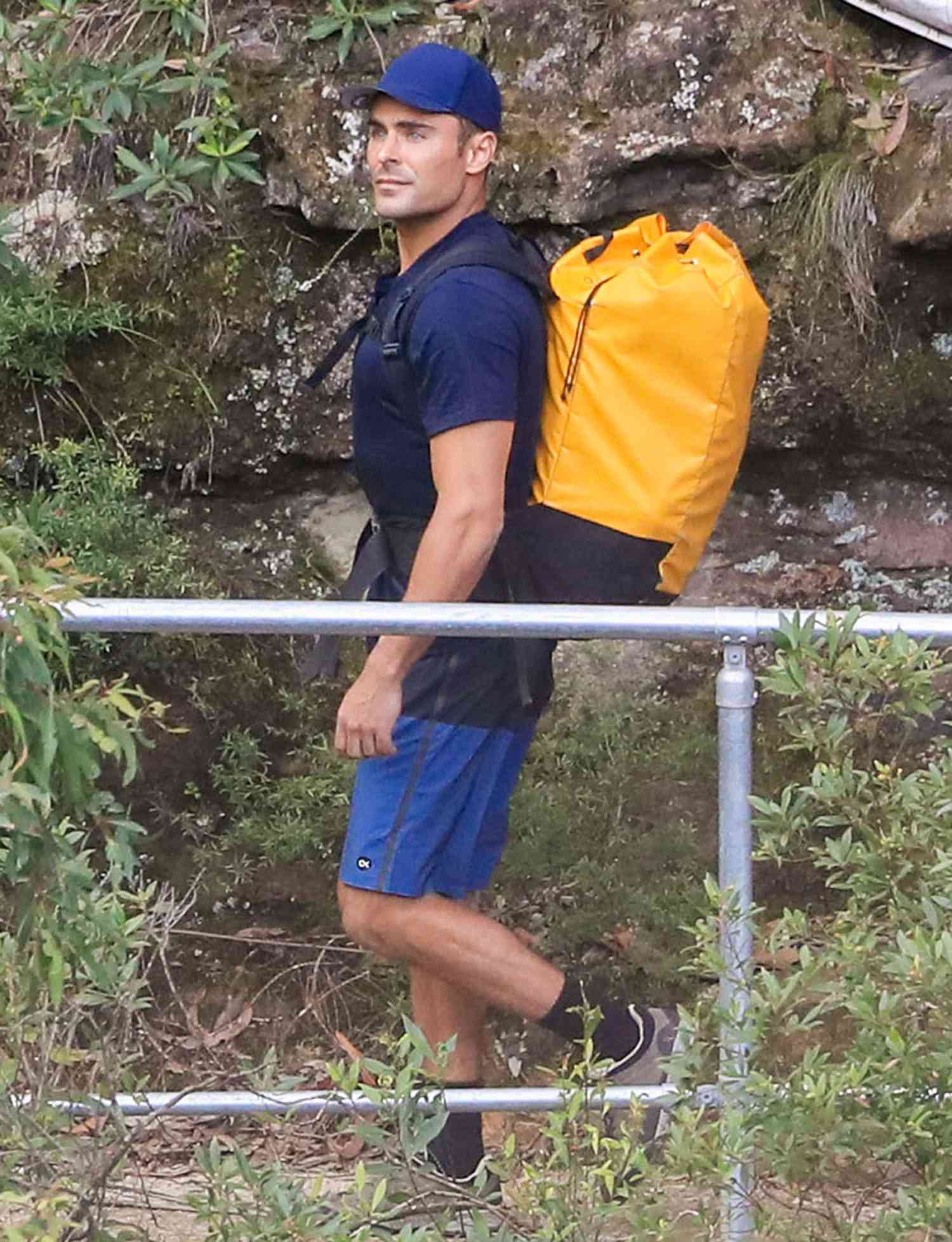 Zac Efron goes on an abseiling adventure at Katoomba in the NSW Blue Mountains
