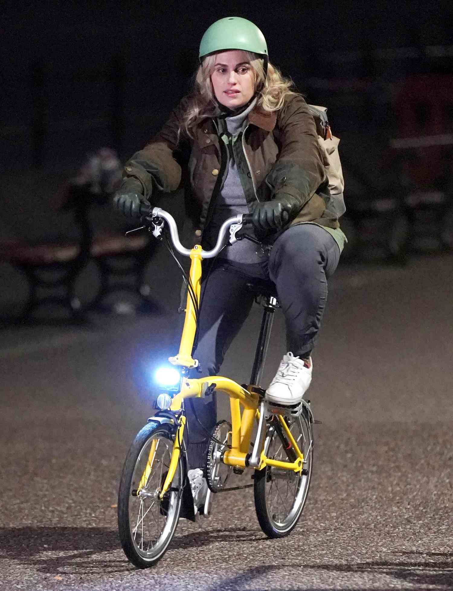 Rebel Wilson Gets Back On Two Wheels Following Her Bike Accident In London, As She Films Her New Movie In Merseyside.
