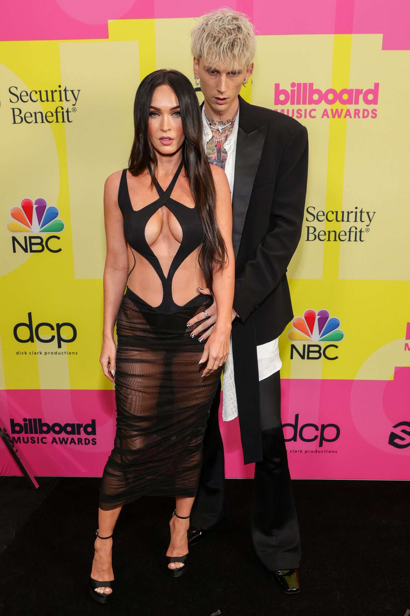 Megan Fox Wears Risqué Gown Walking 2021 BBMAs Red Carpet with Machine Gun Kelly | PEOPLE.com