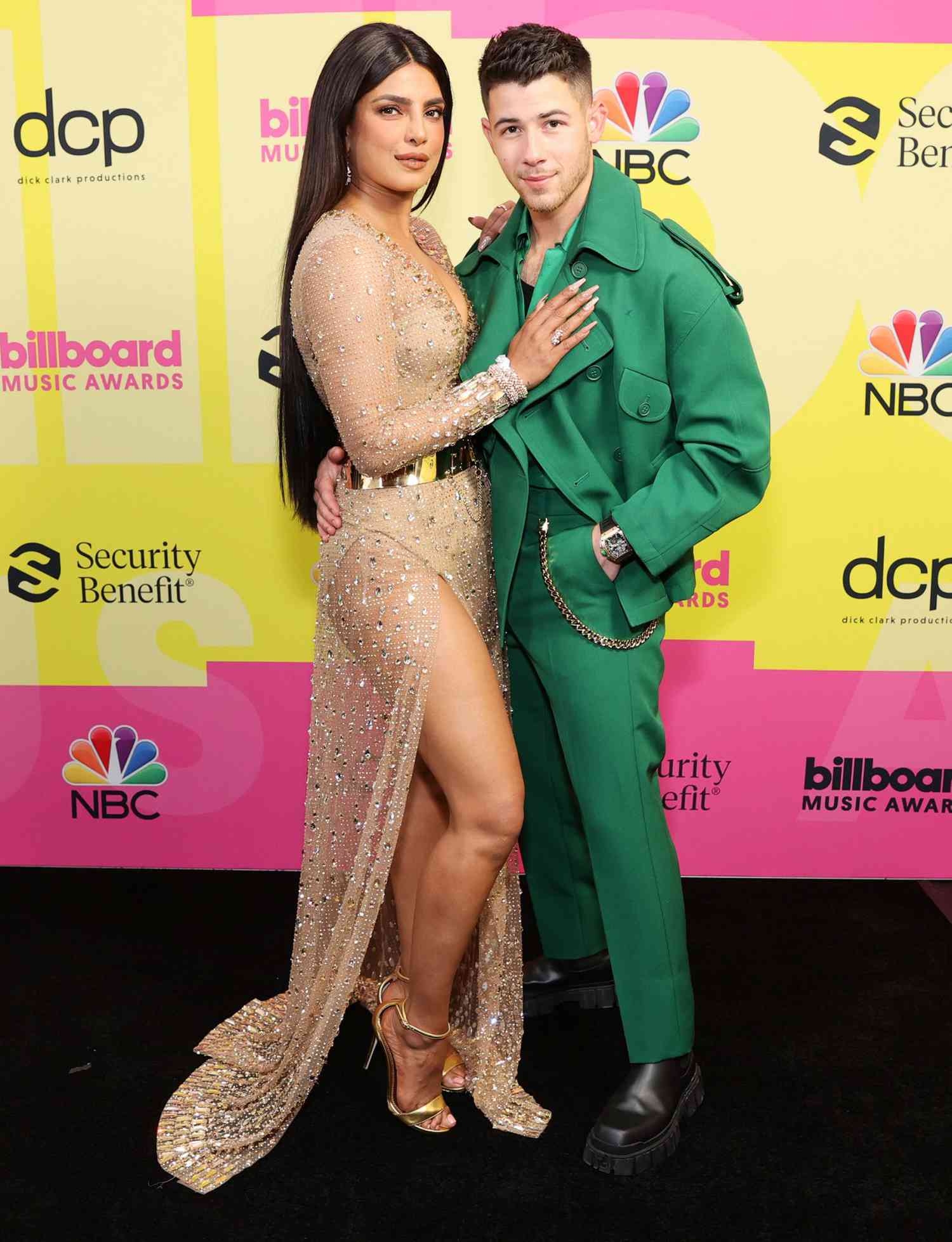 Priyanka Chopra Jonas and Nick Jonas pose backstage for the 2021 Billboard Music Awards, broadcast on May 23, 2021 at Microsoft Theater in Los Angeles, California