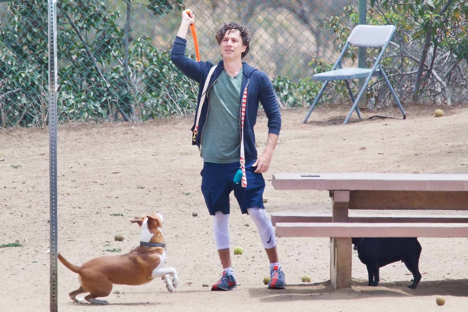 Zach Braff Gets Close To Mystery Woman As They Spend Time Together At The Dog Park While Florence Pugh Is Overseas Filming.